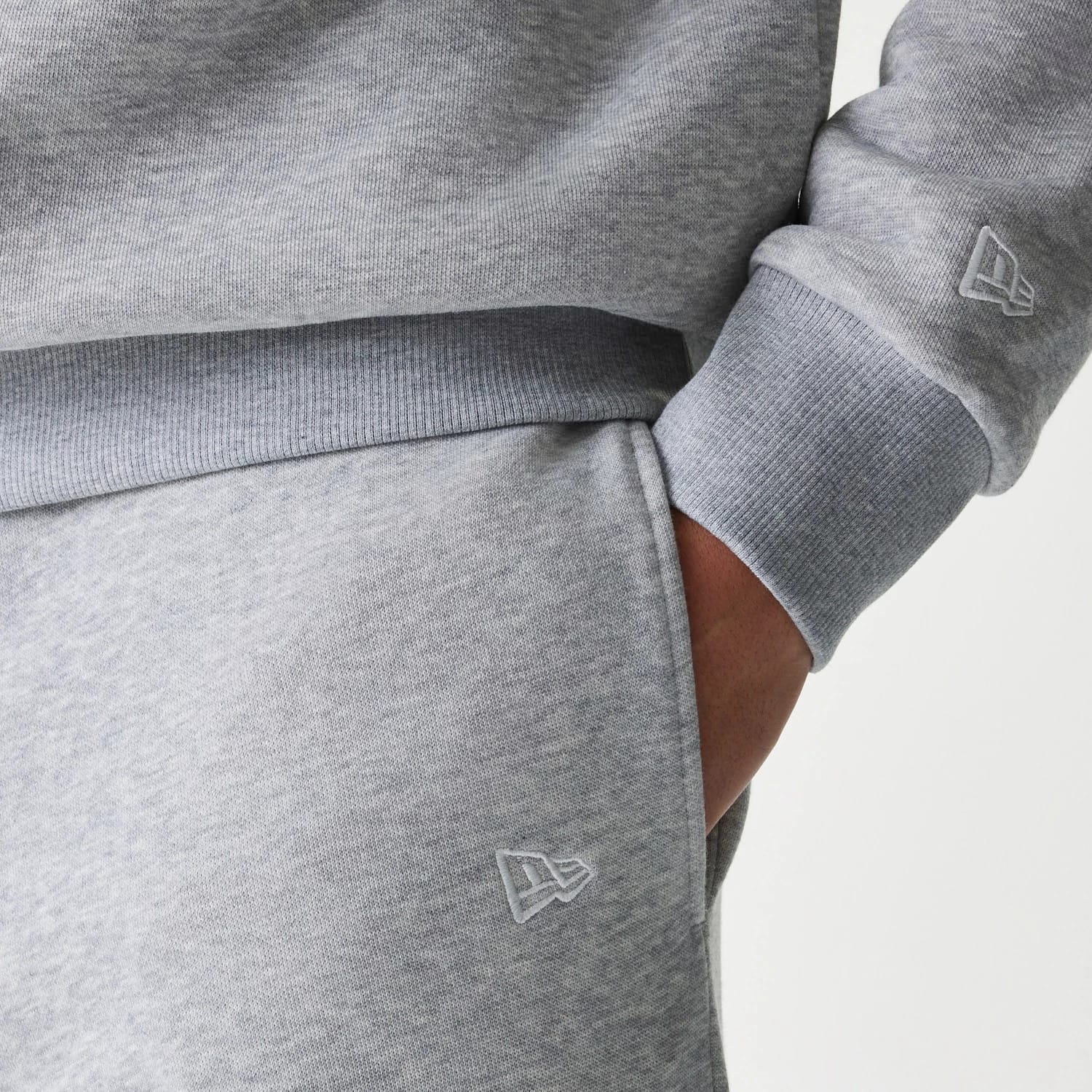 The Male model is wearing New York Yankees MLB League Essential Grey Joggers 4