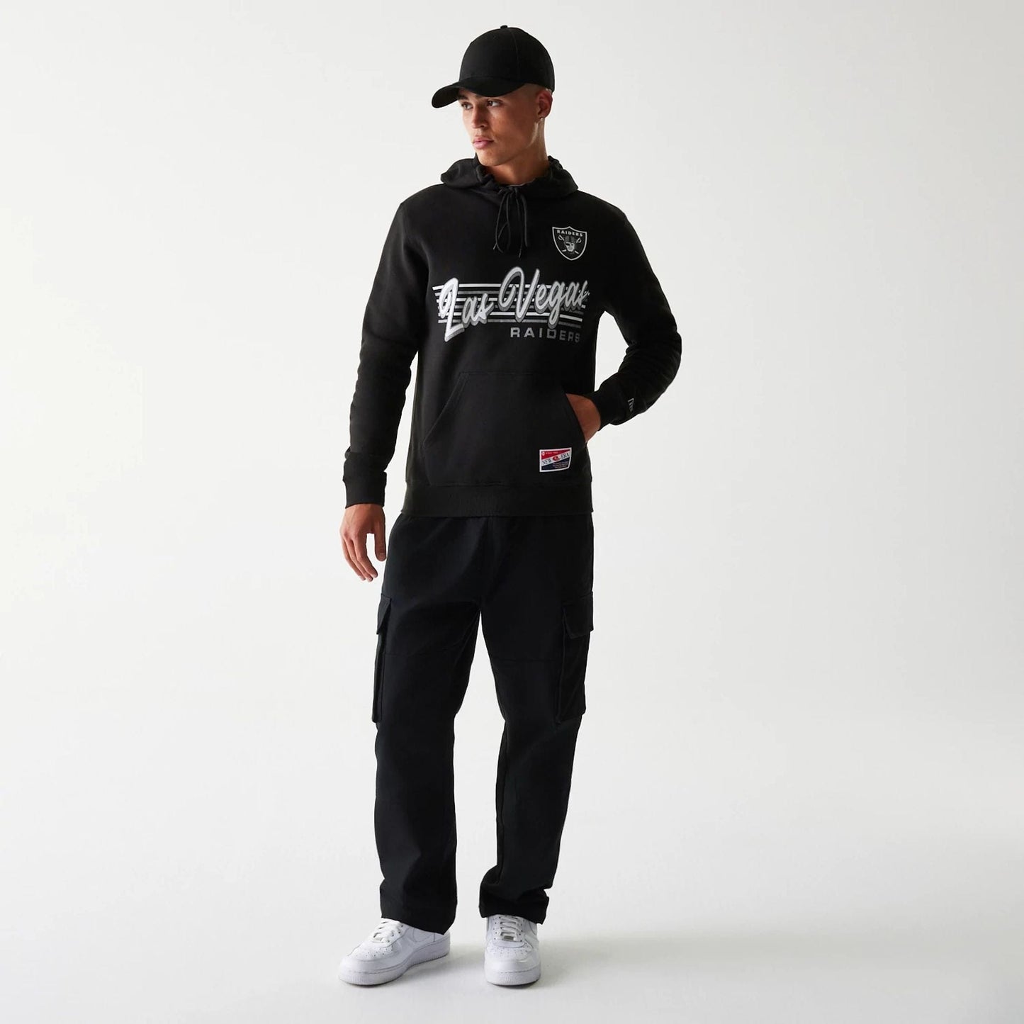 The Male model is wearing Las Vegas Raiders NFL Throwback Black Pullover Hoodie 6
