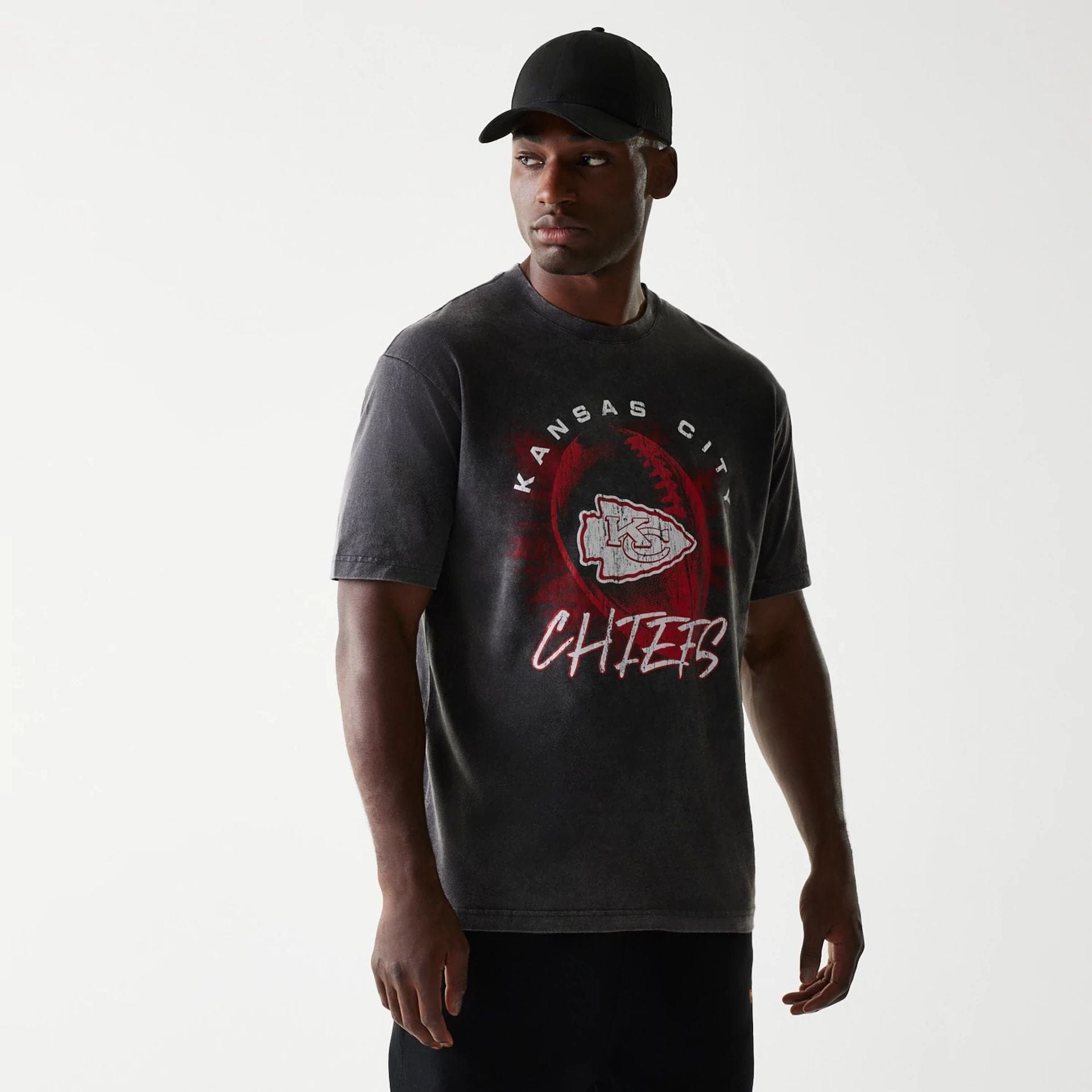 The Male model is wearing Kansas City Chiefs NFL Sport Night Black T-Shirt 1