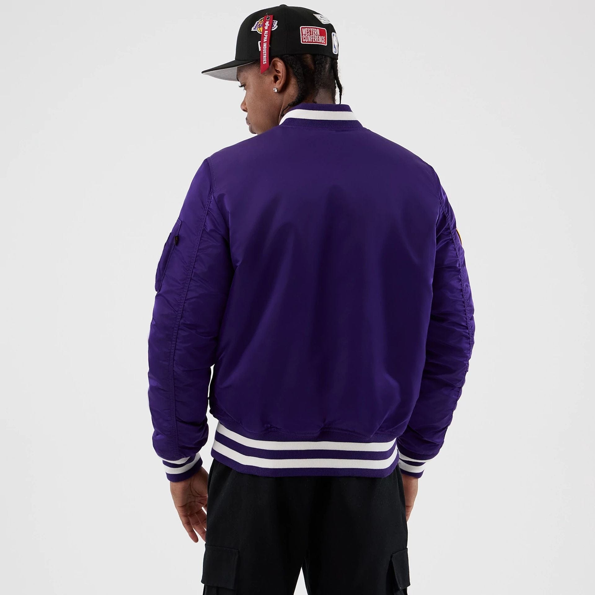 The Male model is wearing LA Lakers NBA x Alpha Purple Jacket 2