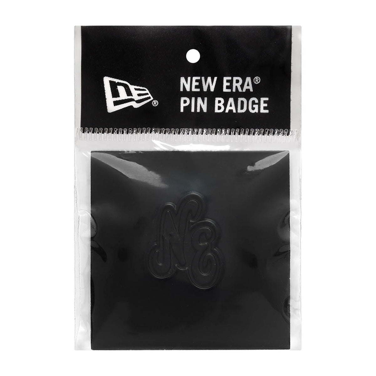 New Era Script Heritage Connect Black Pin Badge, front view showing the black pin badge with raised script lettering NE in the centre, packaged in a clear plastic sleeve with the New Era logo and text at the top.