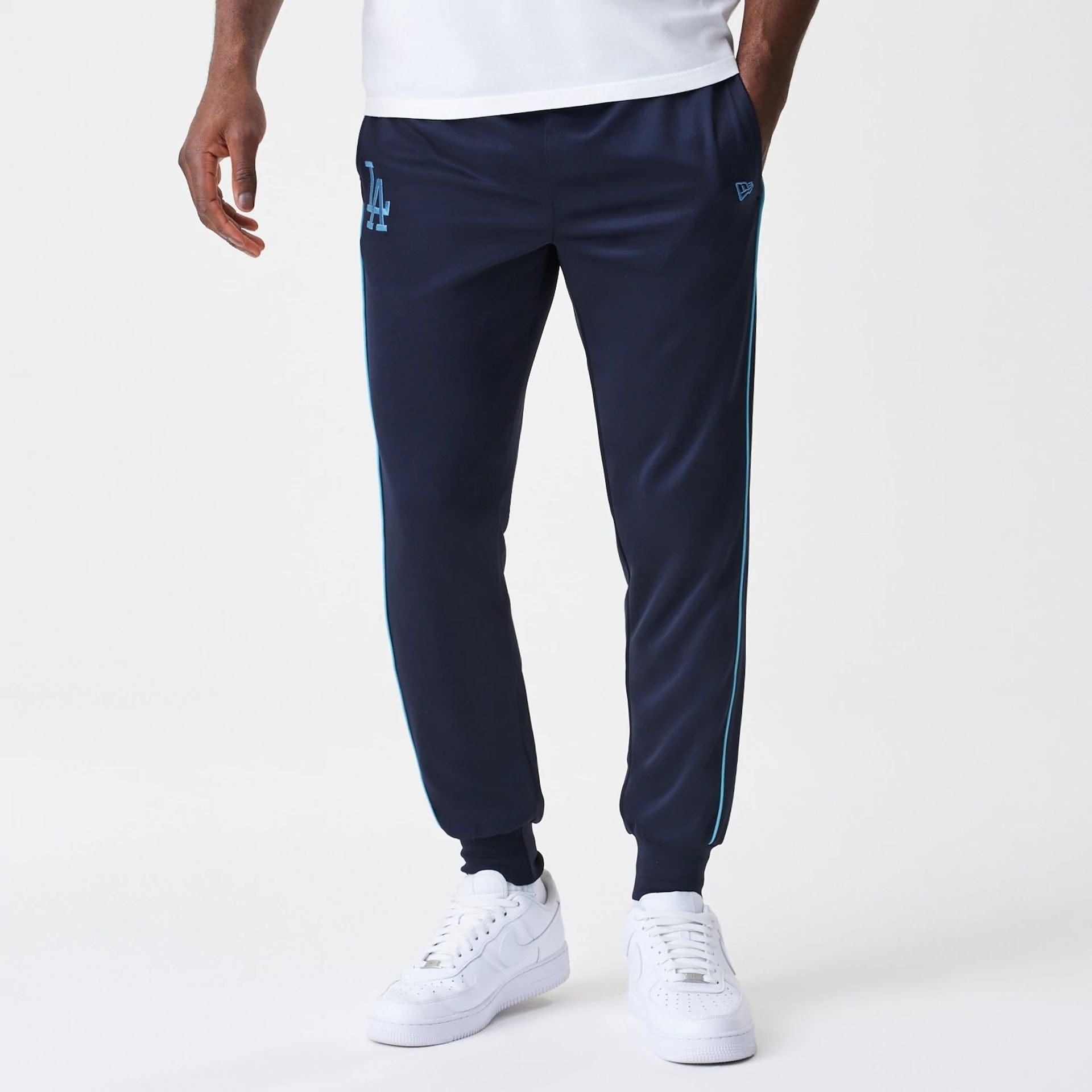 The Male model is wearing LA Dodgers MLB Navy Track Pants 1
