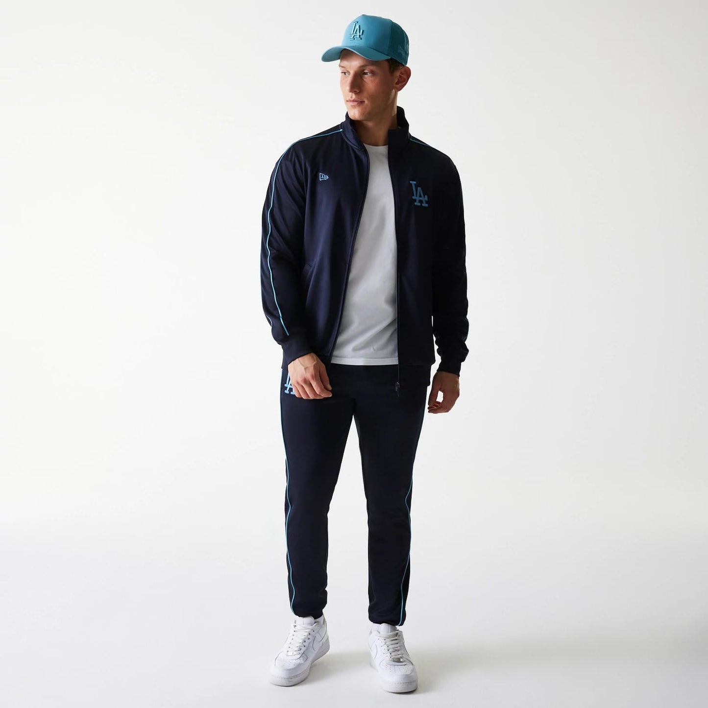 The Male model is wearing LA Dodgers MLB Navy Track Top 8