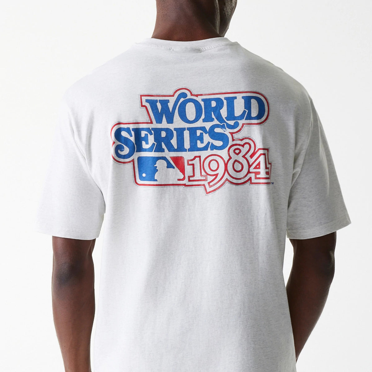 New Era Detroit Tigers MLB World Series Pastel Grey Oversized T-Shirt, rear view showing the large blue and red World Series 1984 graphic on the back, centred on the light grey fabric.