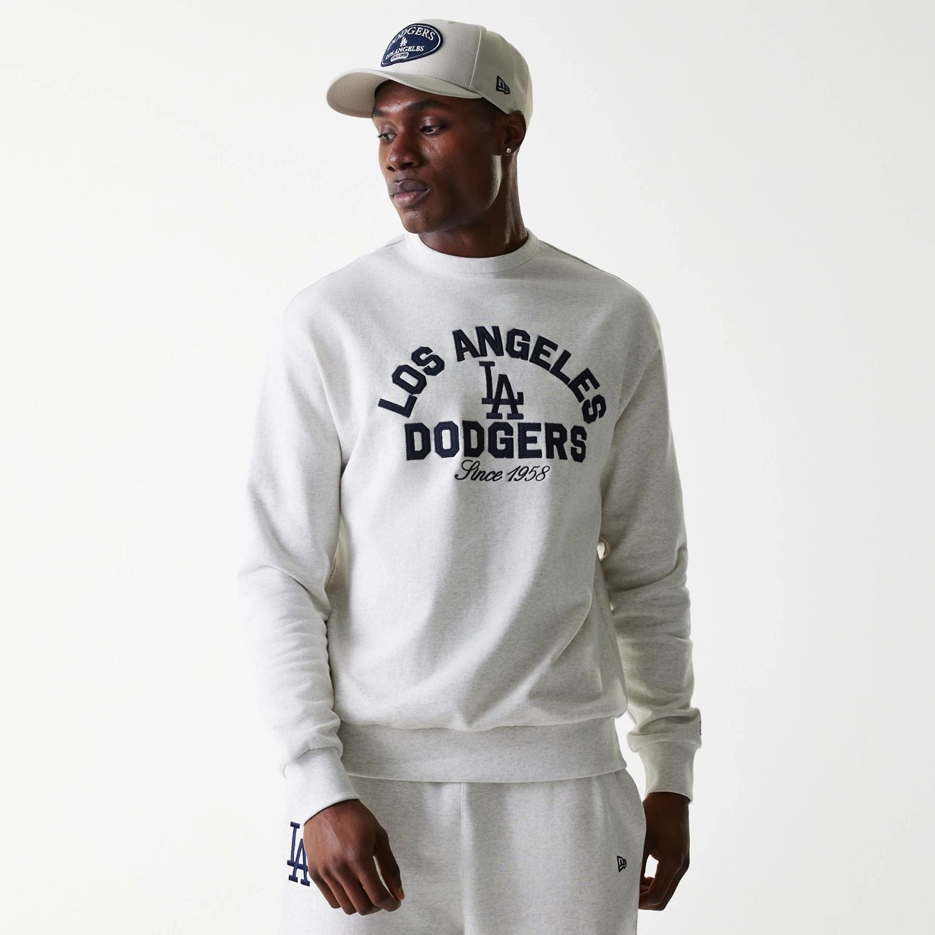 The Male model is wearing LA Dodgers MLB Heritage Pastel Grey Oversized Crew Neck Sweater 1