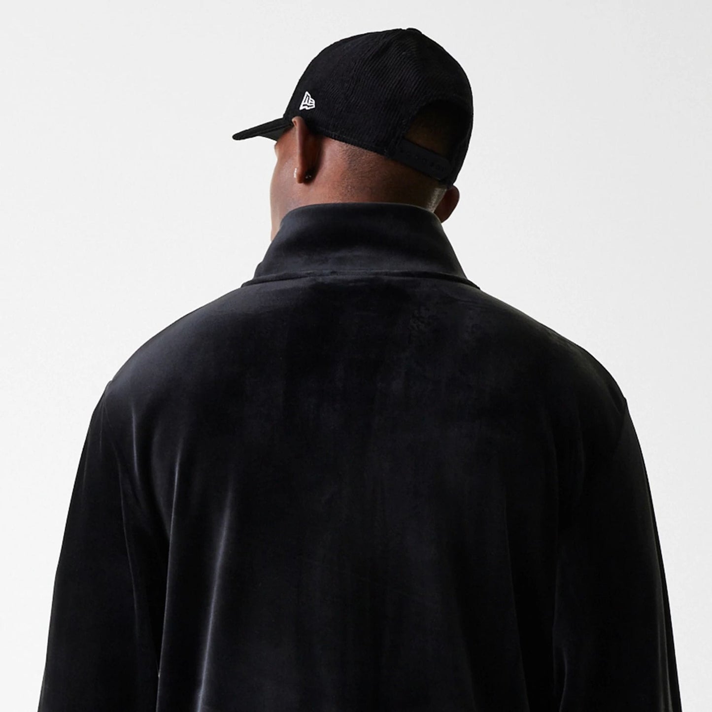 The Male model is wearing New York Yankees MLB Velour Black Track Top 8
