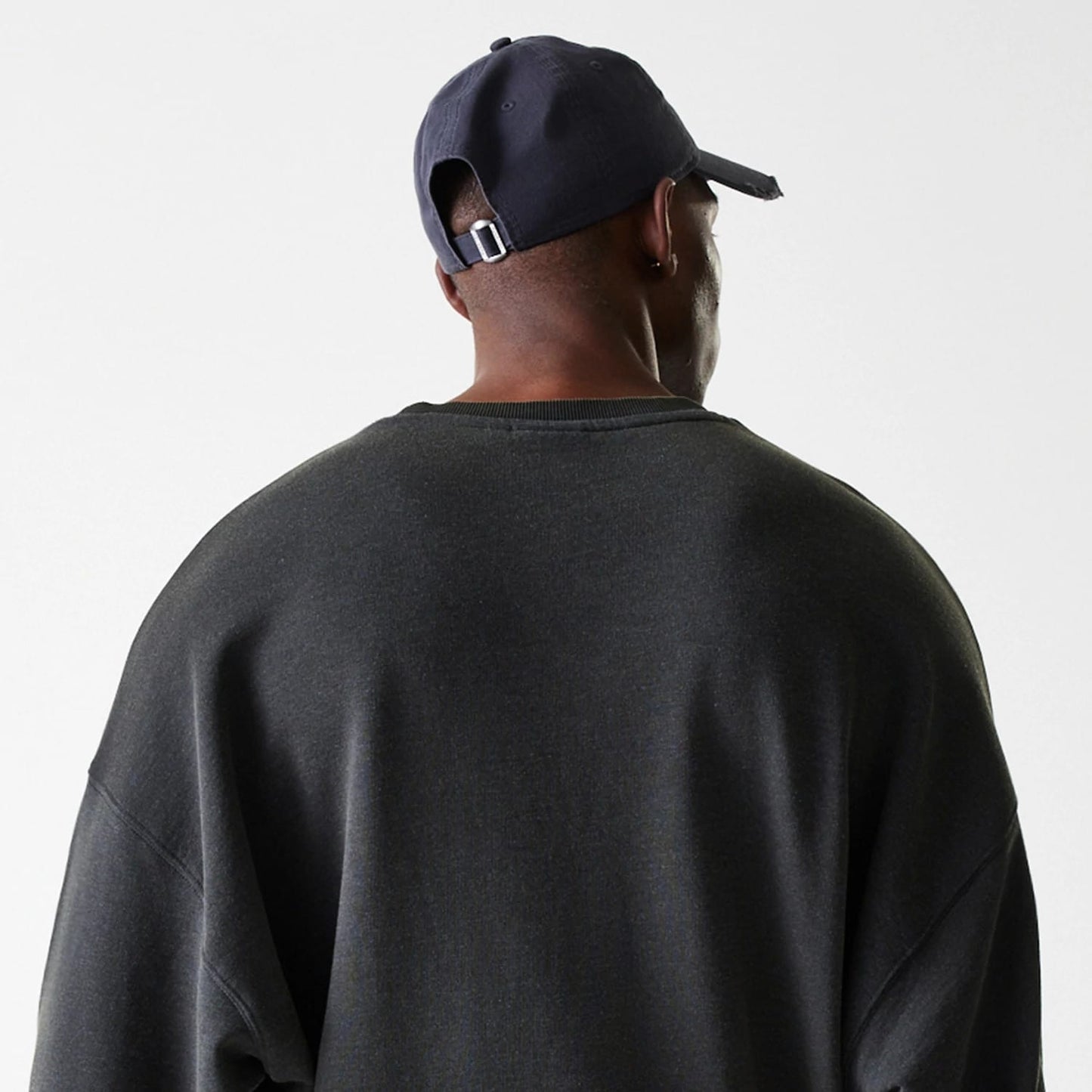 The Male model is wearing LA Lakers NBA Washed Graphic Grey Oversized Crew Neck Sweater 8