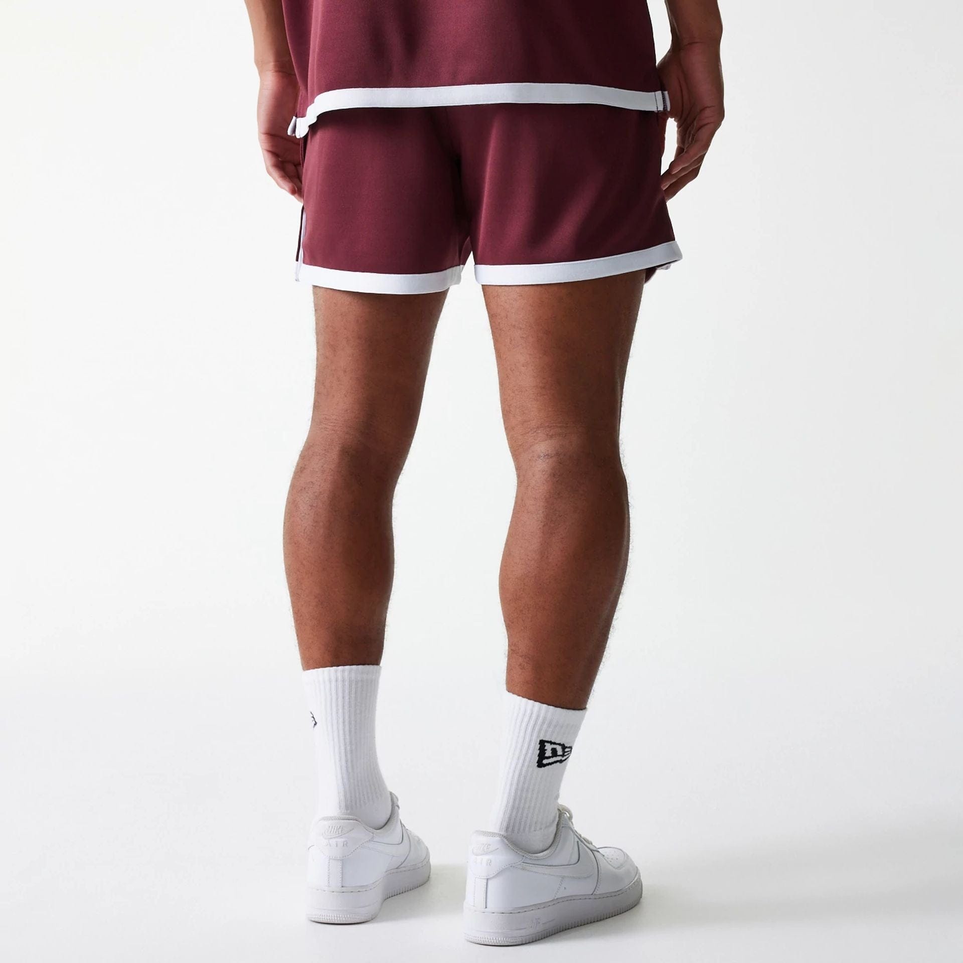 The Male model is wearing Chicago Bulls NBA Snap Button Dark Red Shorts 2