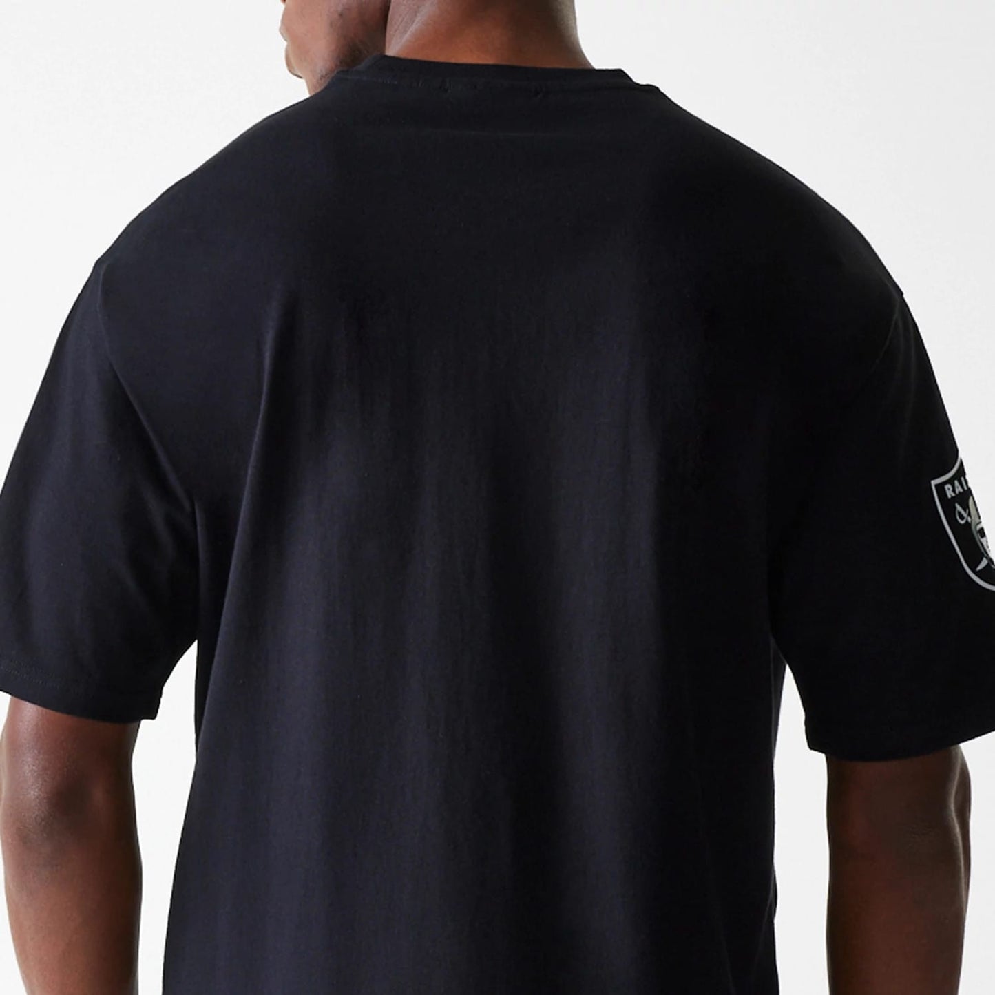 The Male model is wearing Las Vegas Raiders NFL Wordmark Black Oversized T-Shirt 7