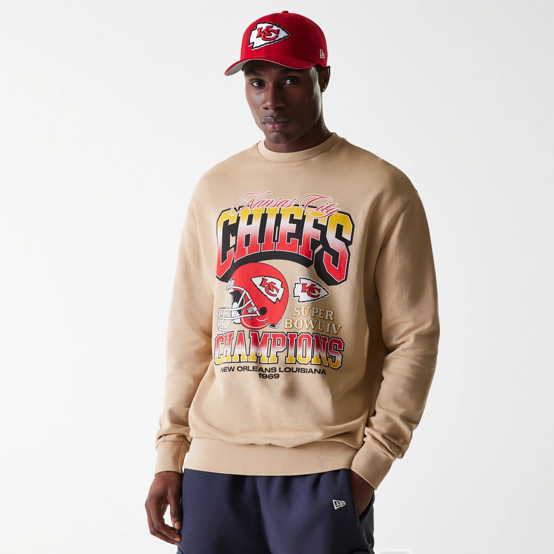 The Male model is wearing Kansas City Chiefs NFL Washed Super Bowl Beige Oversized Crew Neck Sweater 1