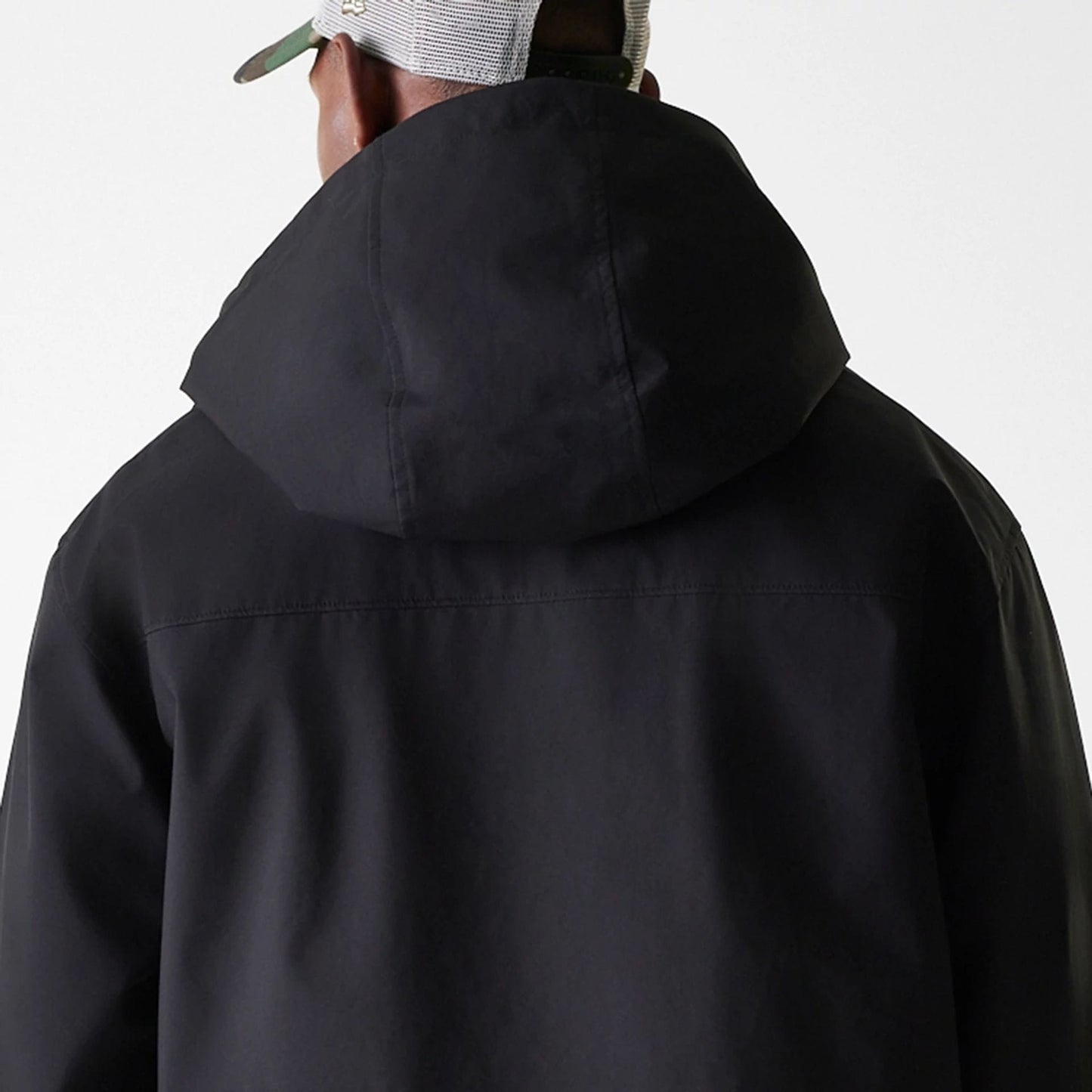 The Male model is wearing New Era Black Coach Jacket 7