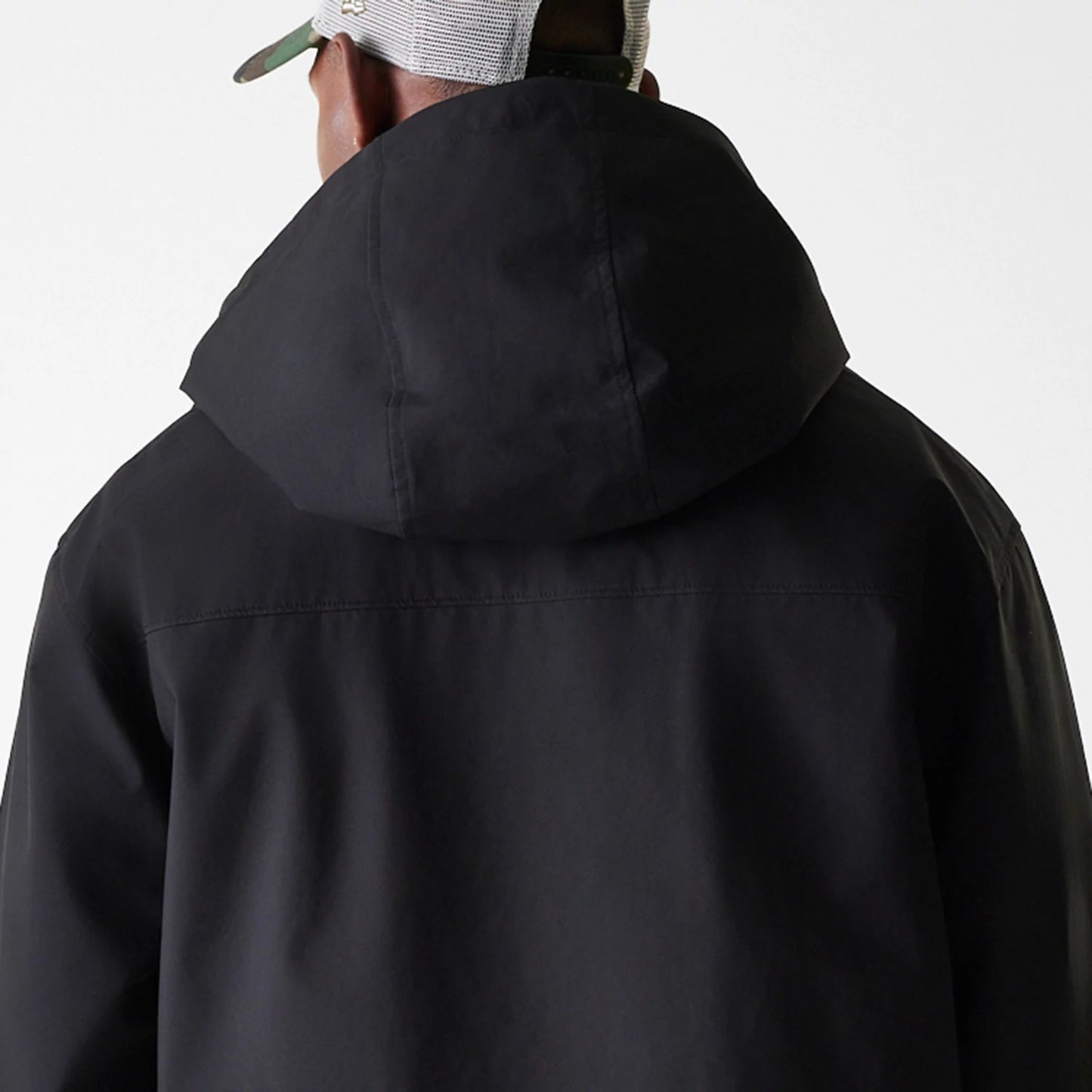 The Male model is wearing New Era Black Coach Jacket 7