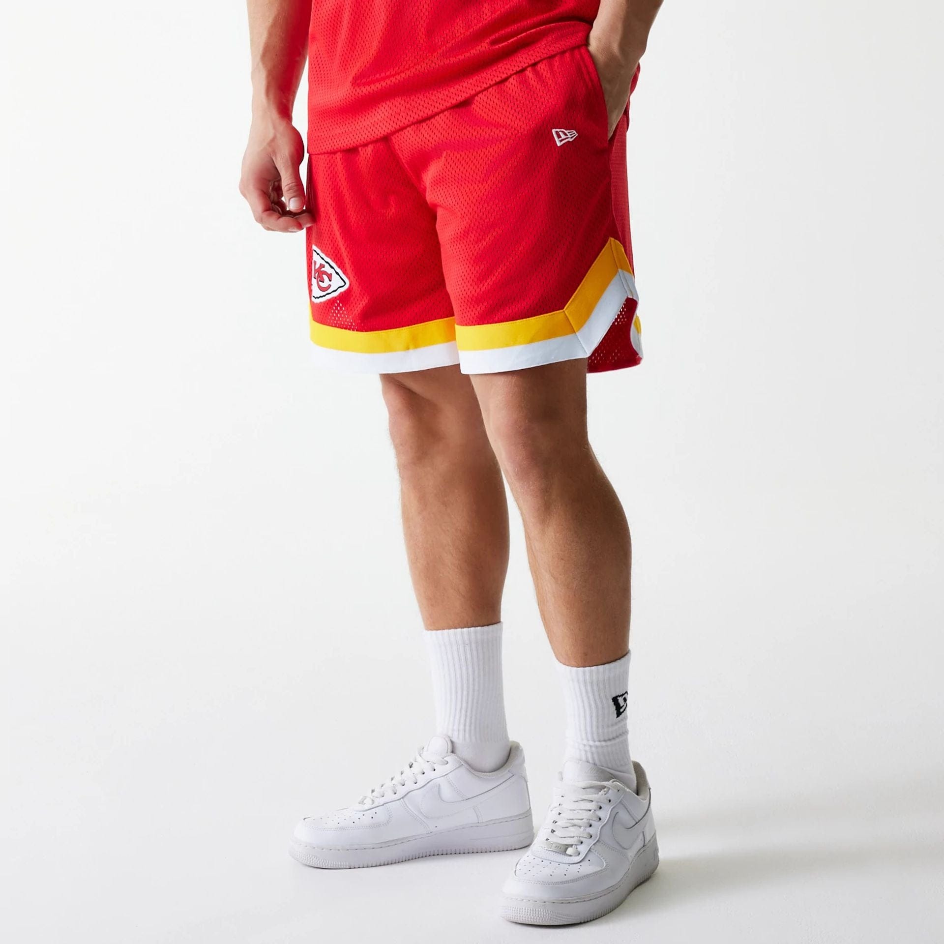 The Male model is wearing Kansas City Chiefs NFL Mesh Red Shorts 1