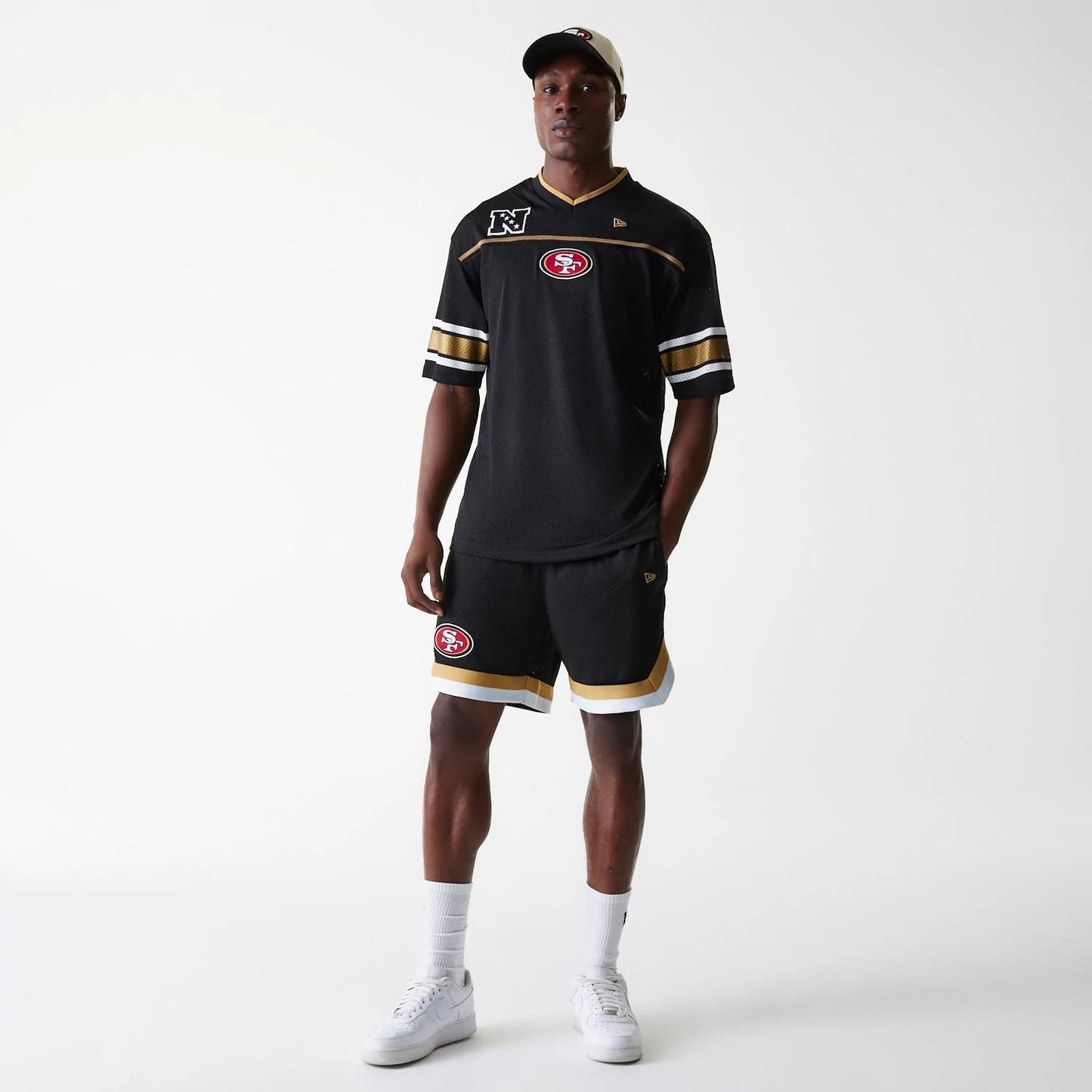 The Male model is wearing San Francisco 49ers NFL Mesh Black Jersey 8