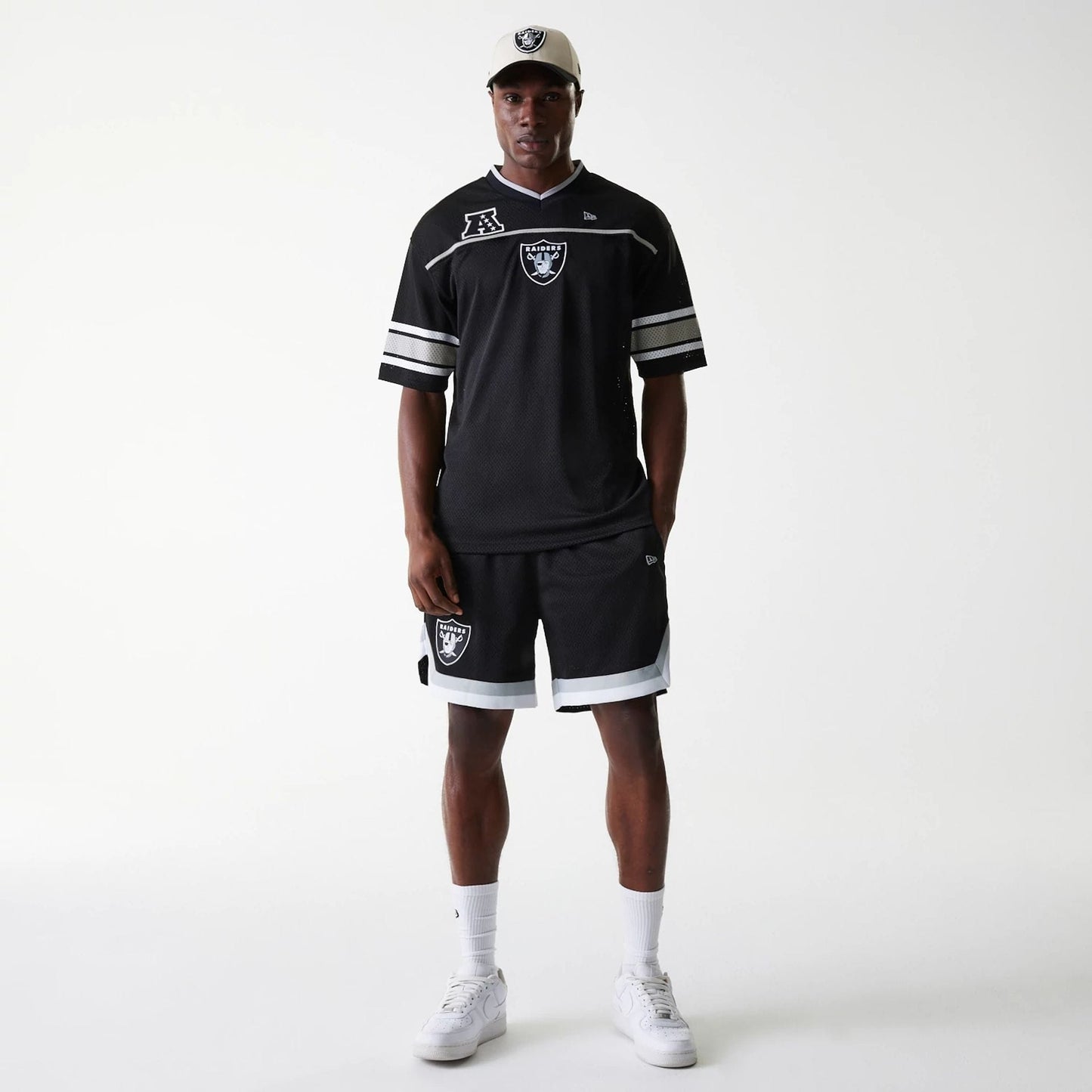 The Male model is wearing Las Vegas Raiders NFL Mesh Black Jersey 8