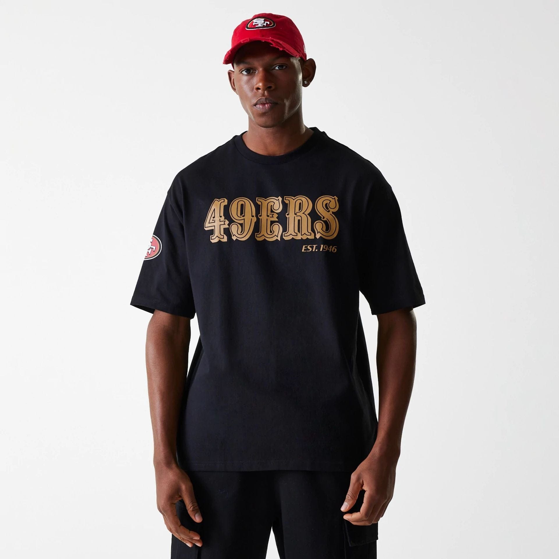 The Male model is wearing San Francisco 49ers NFL Wordmark Black Oversized T-Shirt 1