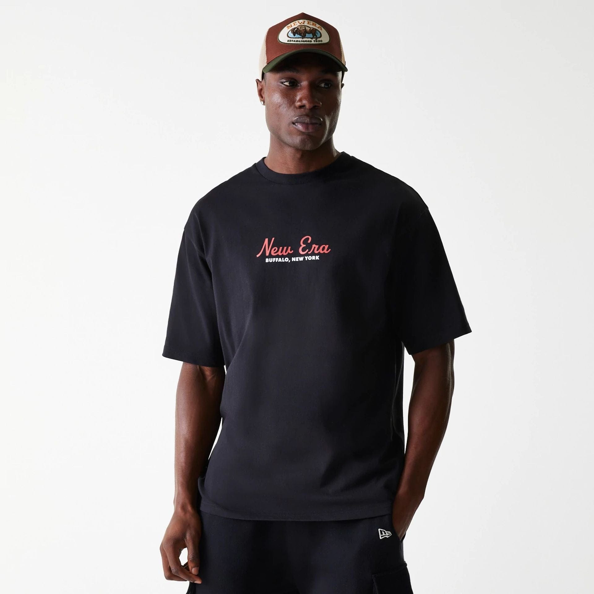 The Male model is wearing New Era Animal Graphic Black Oversized T-Shirt 1