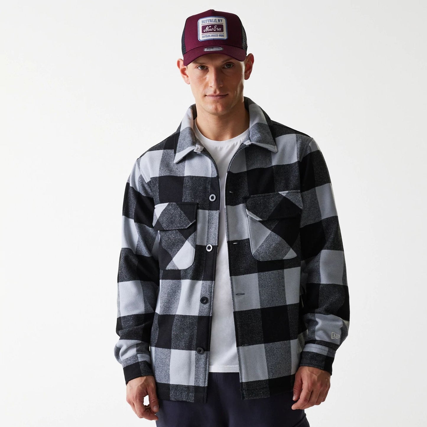 The Male model is wearing New Era Black Shacket 7