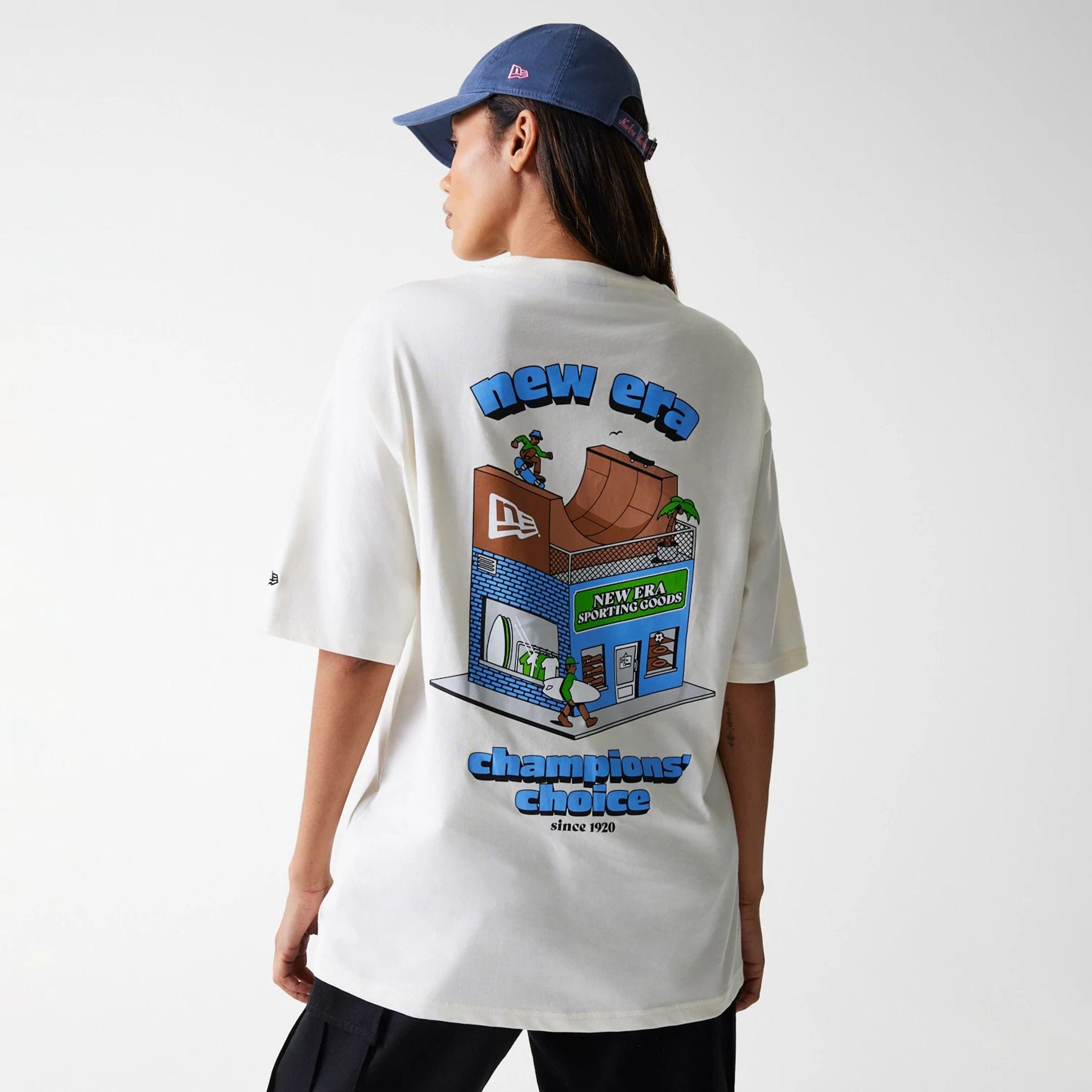 The Male model is wearing New Era Skate Graphic Open White Oversized T-Shirt 2