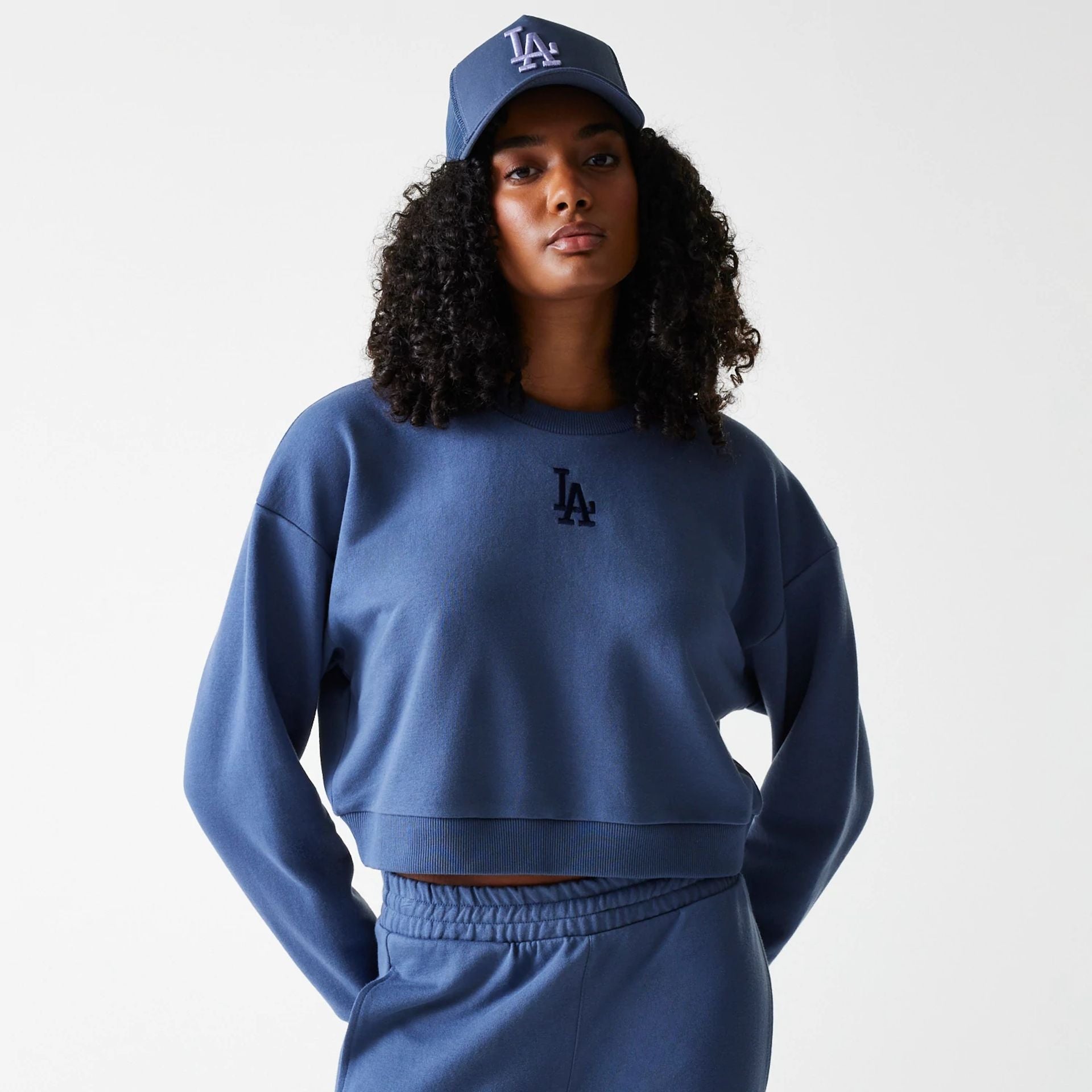 The Female model is wearing LA Dodgers Womens MLB Midi League Essential Dark Blue Cropped Crew Neck Sweater 1