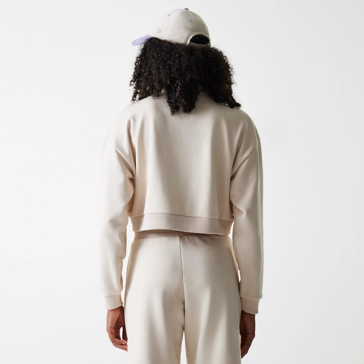 The Female model is wearing LA Dodgers Womens MLB Tonal Light Beige Cropped 1/4 Zip Sweater 2