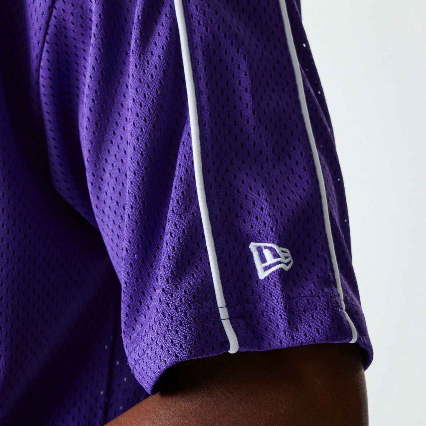The Male model is wearing LA Lakers NBA Piping Purple Oversized Mesh T-Shirt 7