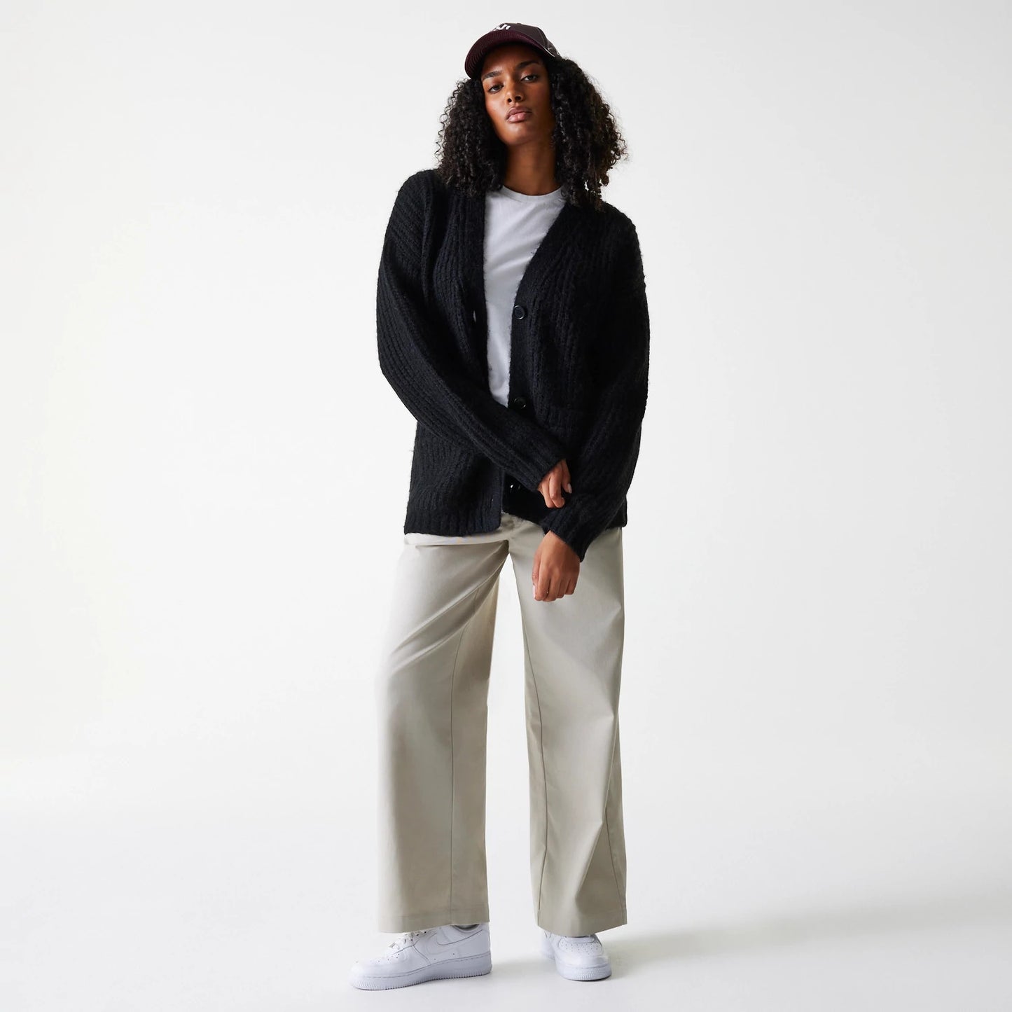 The Female model is wearing New York Yankees Womens MLB Knit Black Cardigan 8