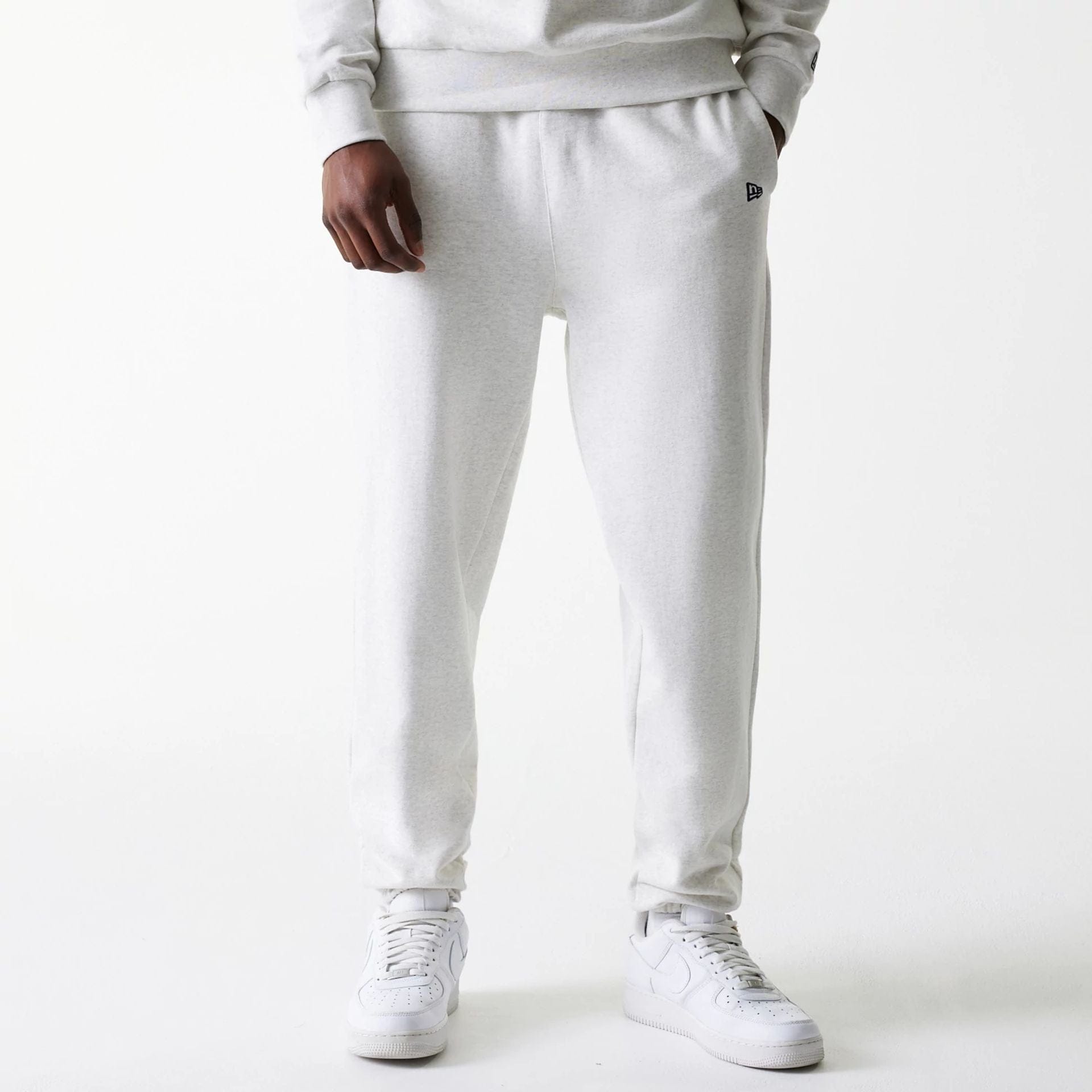 The Male model is wearing LA Dodgers MLB Heritage Pastel Grey Joggers 1