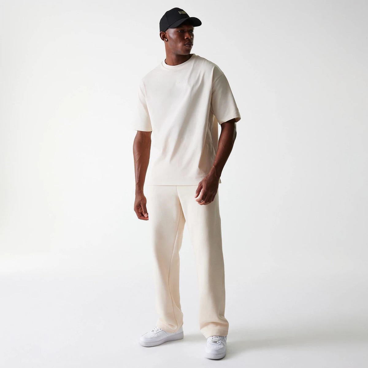 The Male model is wearing New Era Light Beige Straight Leg Joggers 3