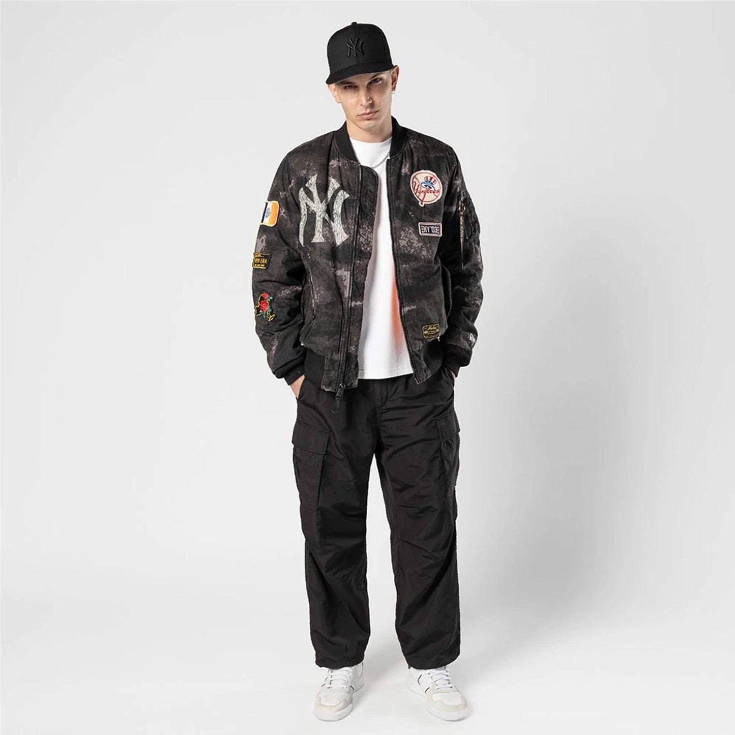 The Male model is wearing New York Yankees MLB X Alpha Black Bomber Jacket 6