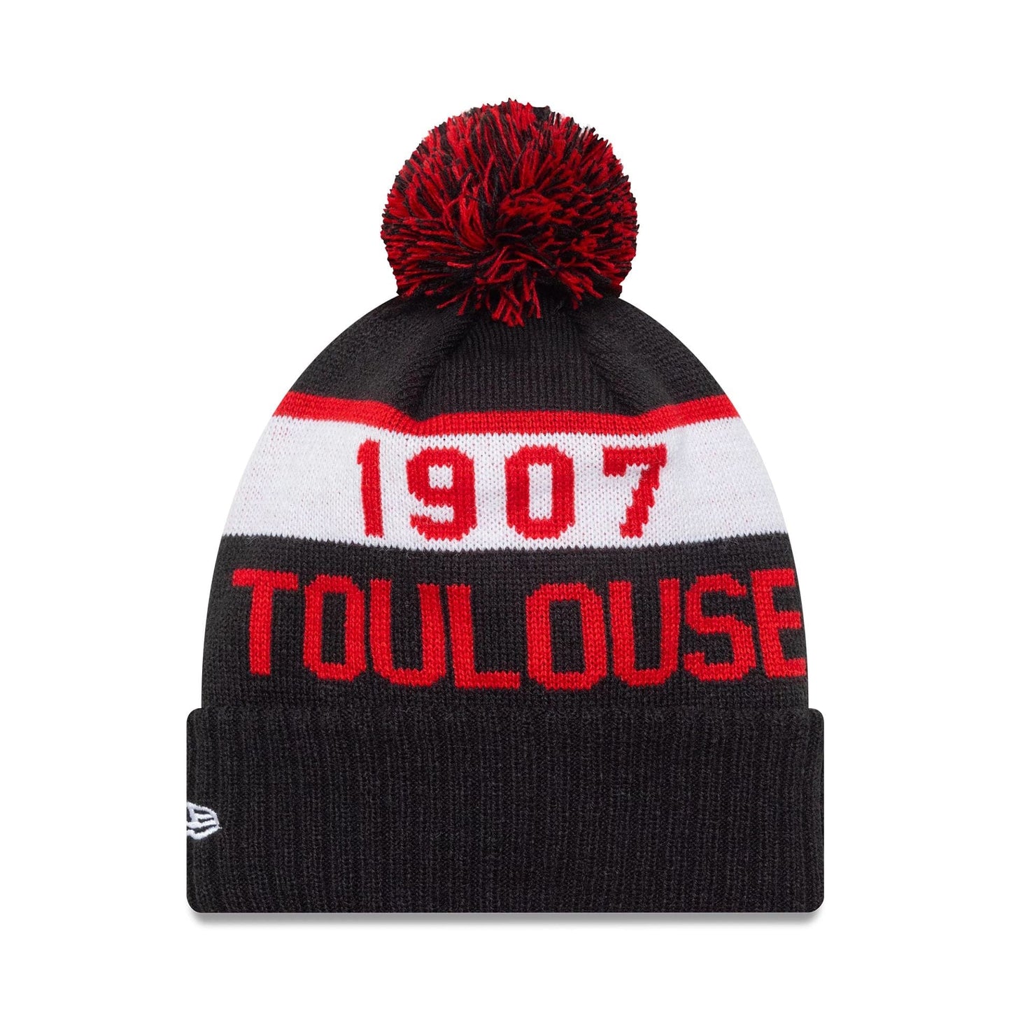 New Era Stade Toulousain Kids Black Sport Knit Beanie Hat, front view with a black and red pom-pom and the year 1907 in red on a white band above the red Toulouse text, featuring the New Era flag logo on the left side.