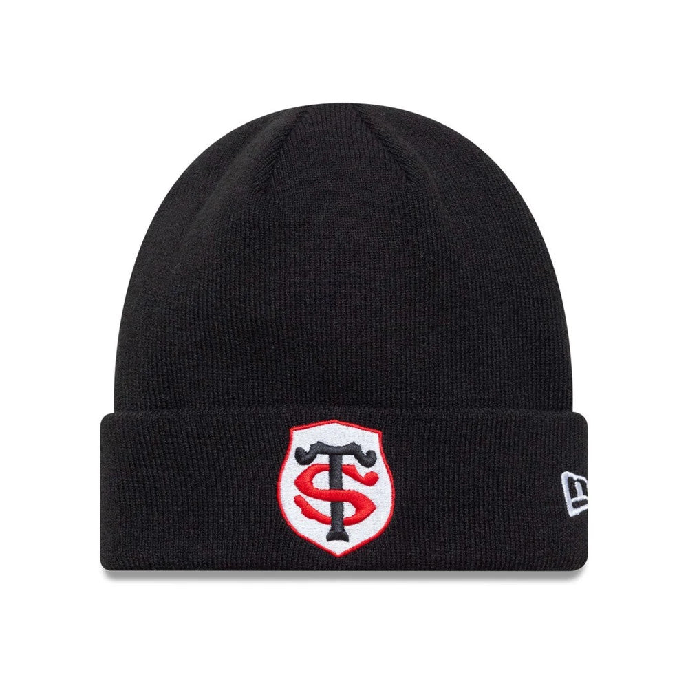 New Era Stade Toulousain Core Black Cuff Knit Beanie Hat, front view showing the Stade Toulousain logo embroidered on the cuff with the New Era flag logo on the left side of the black knit design.