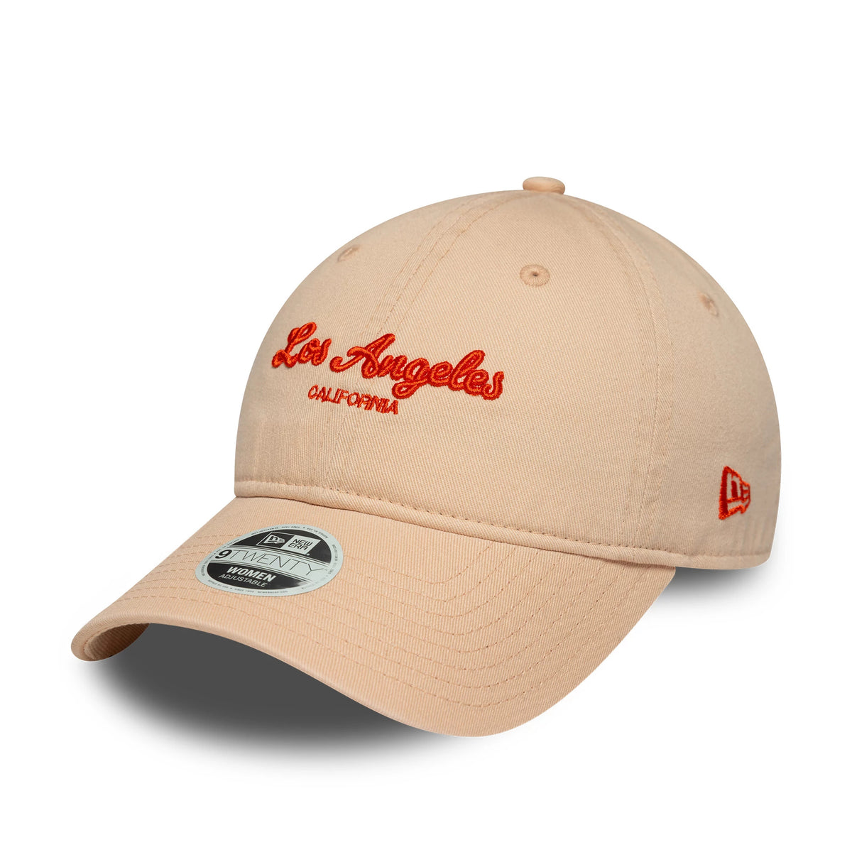 Womens New Era City Pastel Pink 9TWENTY Adjustable Cap, three-quarter view showing raised red Los Angeles embroidery on the front panel, a curved visor with a 9TWENTY size sticker, and the New Era flag logo on the left side.