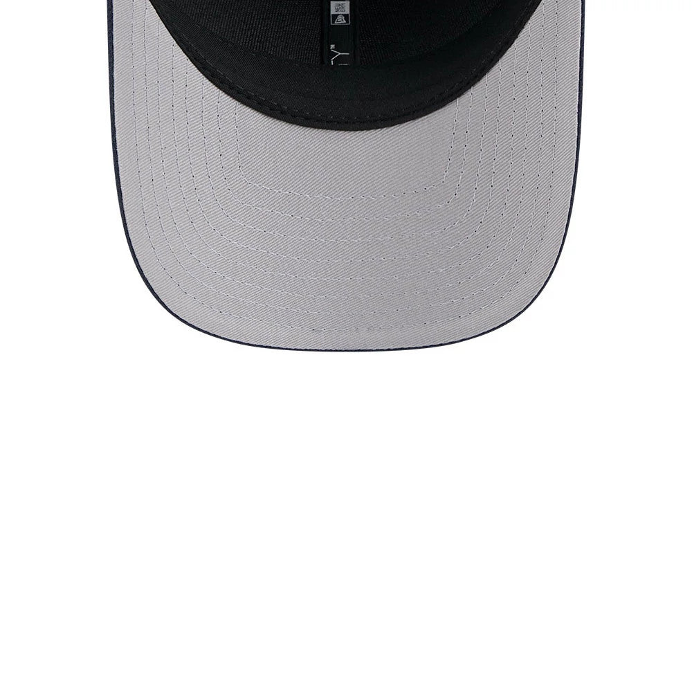 Chicago Bears NFL Team Navy New Era 9FORTY M-Crown Cap, inside view showing the black undervisor and sweatband with a black inner taping strip, highlighting the structure of the visor from beneath.