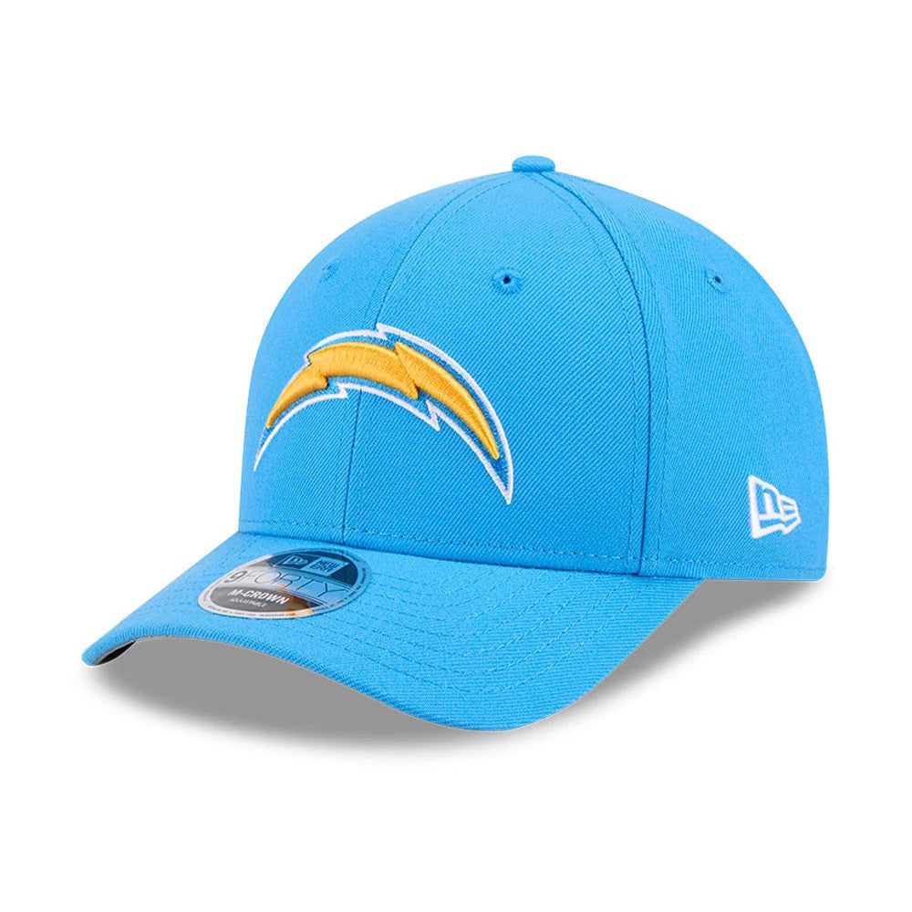 LA Chargers NFL Team Blue New Era 9FORTY M-Crown Cap, three-quarter view showing the yellow embroidered Chargers logo on the front panel, structured blue crown with blue visor and a 9FORTY size sticker, and the New Era flag logo on the left side.