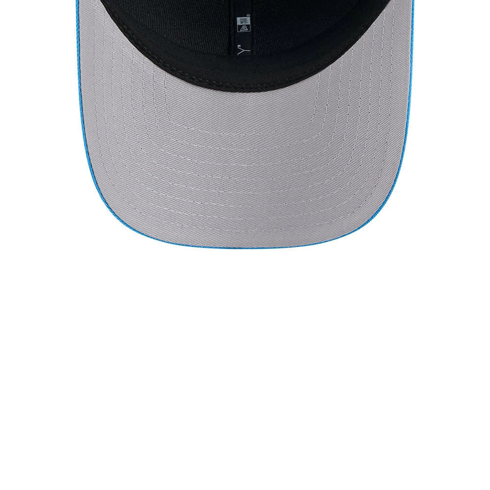 LA Chargers NFL Team Blue New Era 9FORTY M-Crown Cap, inside view showing the black sweatband, grey undervisor with blue edge stitching, and inner taping with brand and size labels on the structured crown.