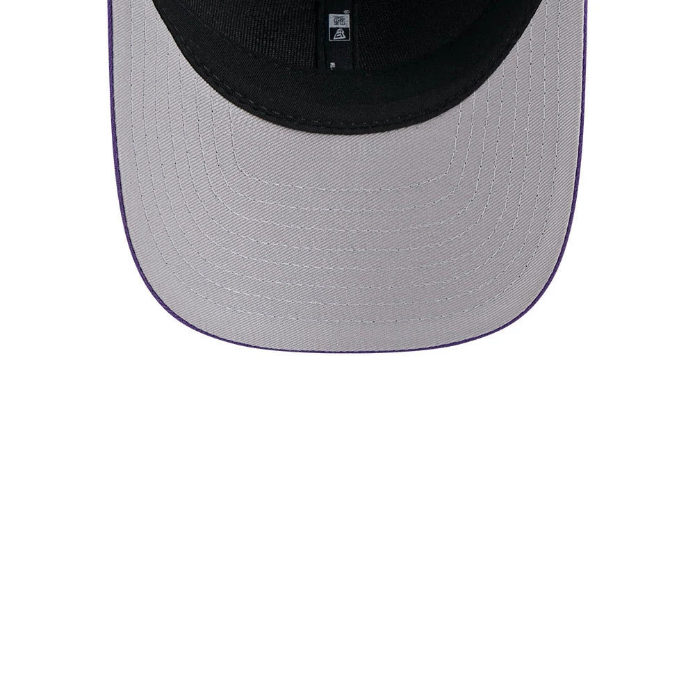 Minnesota Vikings NFL Team Purple New Era 9FORTY M-Crown Cap, inside view showing the grey undervisor, dark sweatband and centre seam taping, with a small black and white label attached.