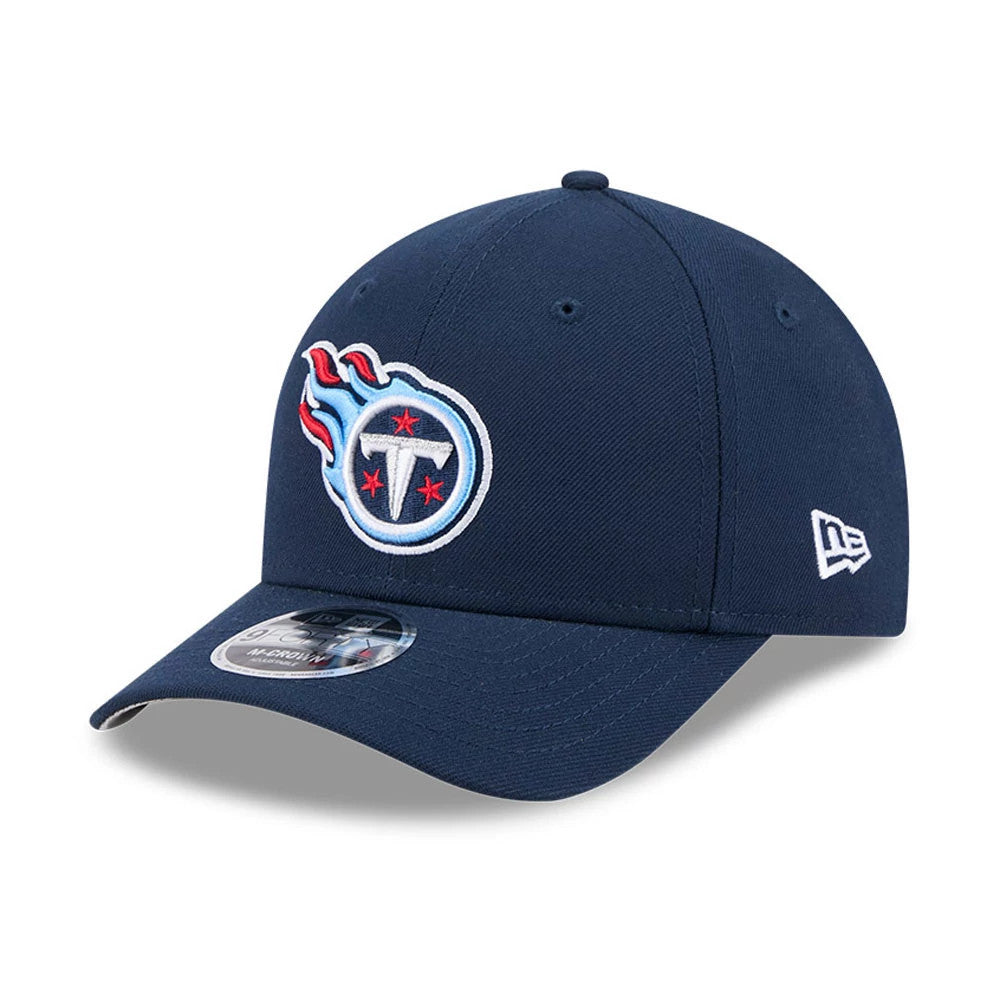 Tennessee Titans NFL Team Dark Blue New Era 9FORTY M-Crown Cap, front view showing raised embroidery of the Titans logo on the front panel, a curved visor with a 9FORTY size sticker, and the white New Era flag logo on the left side.