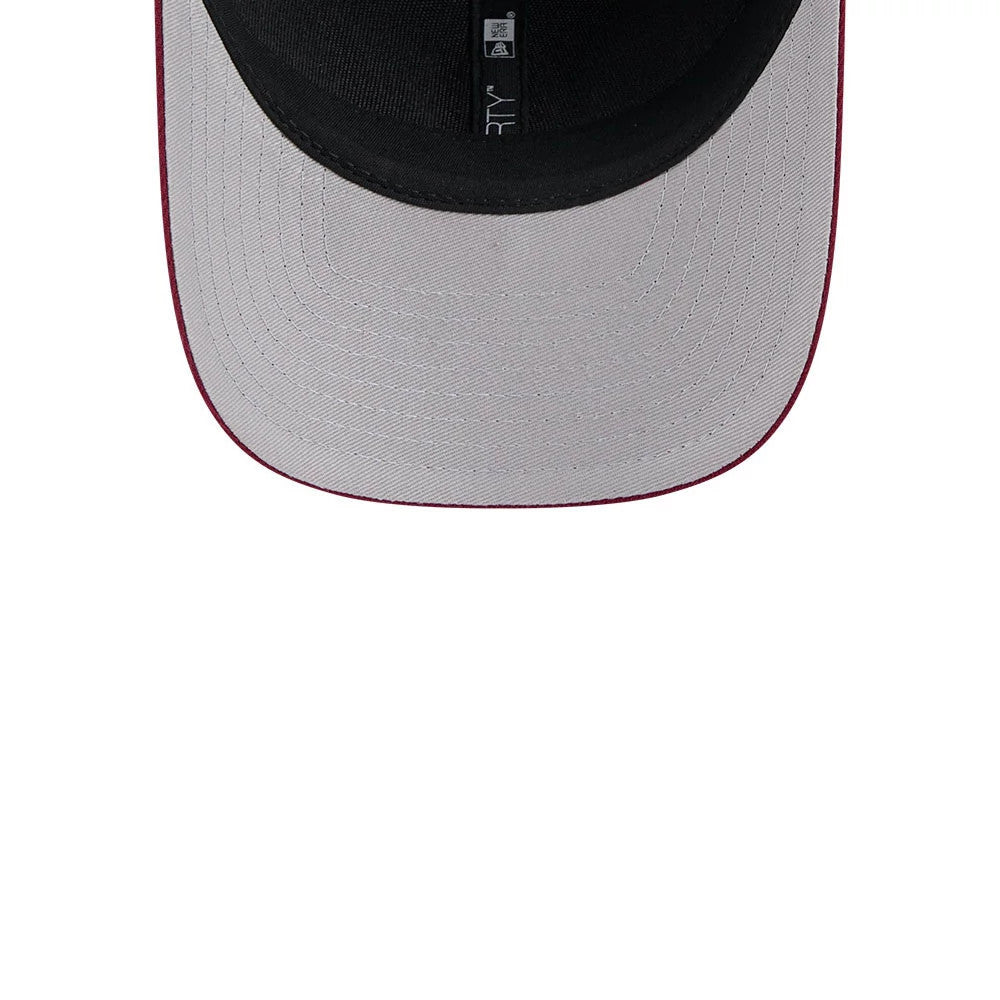Pictured is this NFL Team Washington Commanders 9FORTY M-Crown cap in dark red. 2