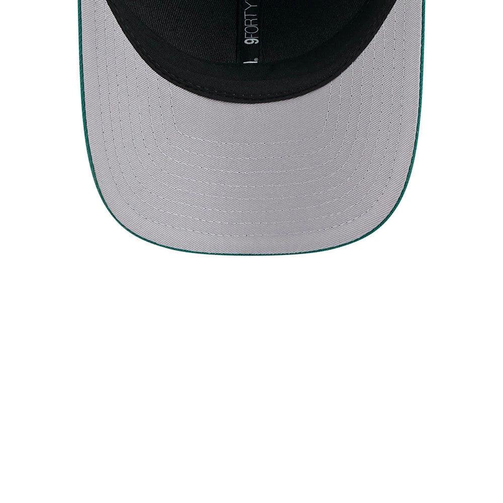 New York Jets NFL Team Green New Era 9FORTY M-Crown Cap, inside view showing the black sweatband, grey undervisor with green edge detail, and the 9FORTY size sticker on the underside of the visor.