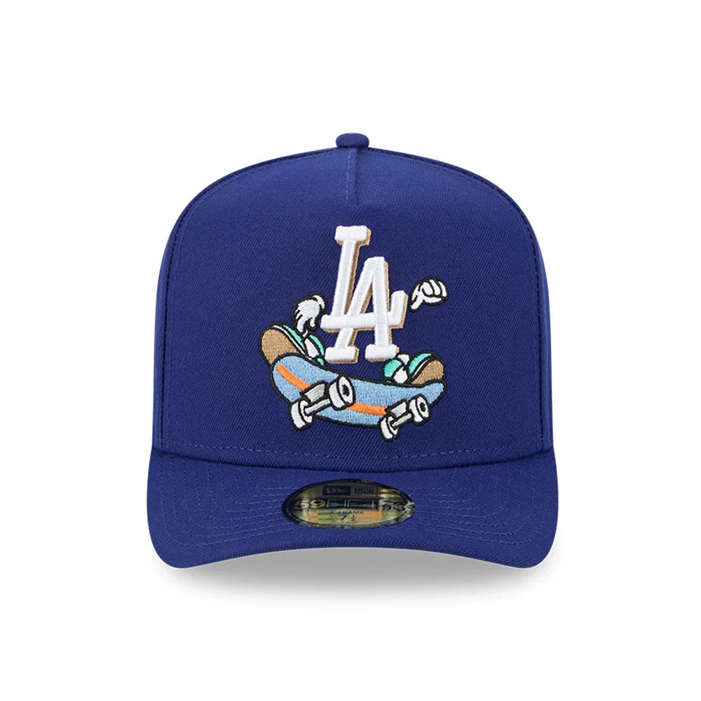 LA Dodgers MLB Cartoon Dark Blue New Era 59FIFTY A-Frame Fitted Cap, front view showing a white LA logo embroidered above a cartoon skateboarding figure, with a gold 59FIFTY size sticker centred on the visor.