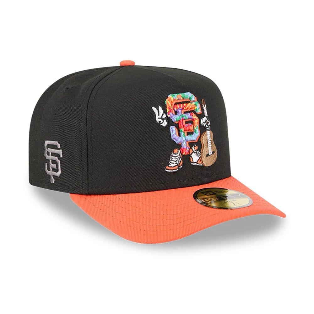 San Francisco Giants MLB Cartoon Black New Era 59FIFTY A-Frame Fitted Cap, three-quarter view showing a colourful cartoon graphic with a guitar on the front panel, orange structured visor, grey SF logo on the left side and gold 59FIFTY size sticker.