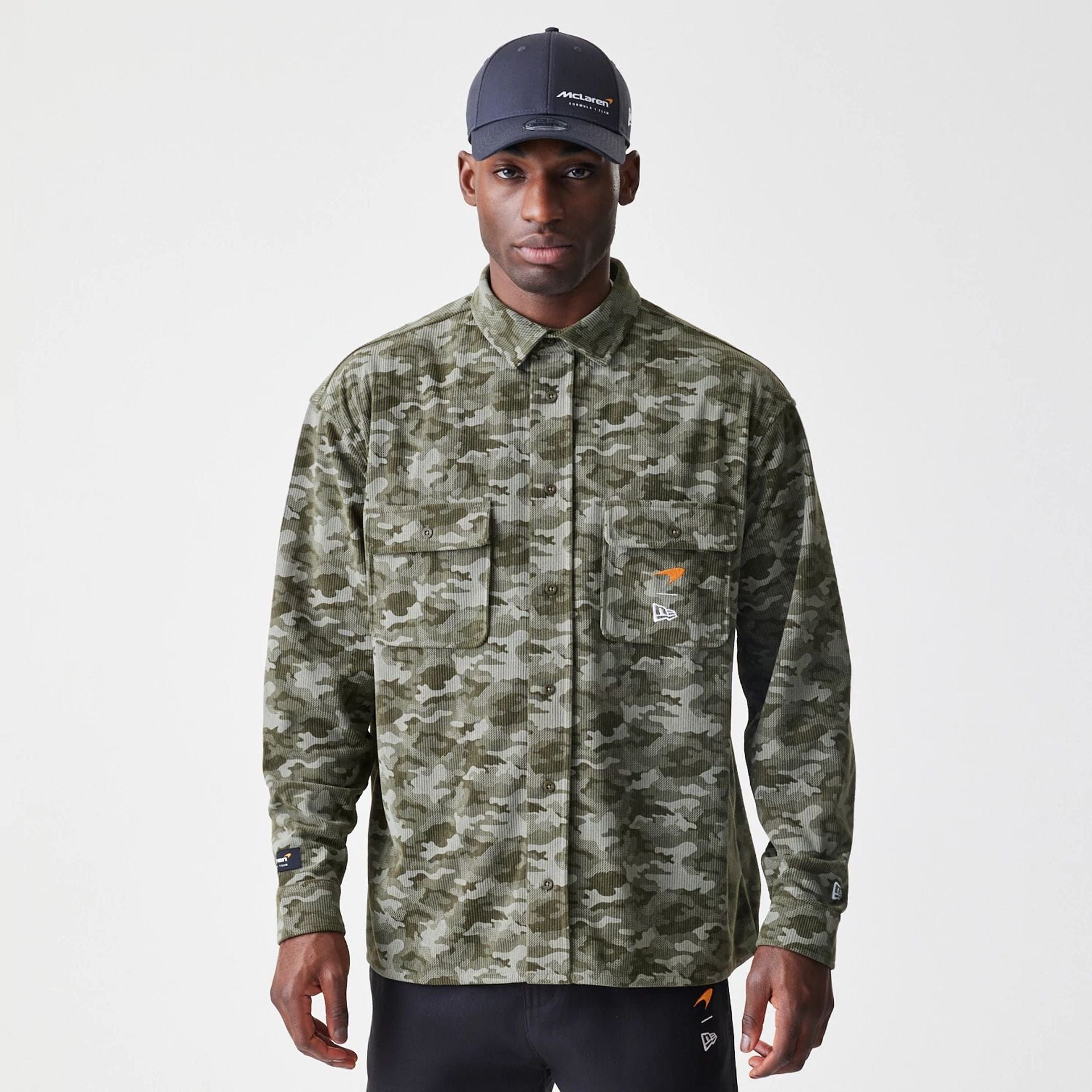 The Male model is wearing McLaren Racing Graphic Green Long Sleeve Shirt 1