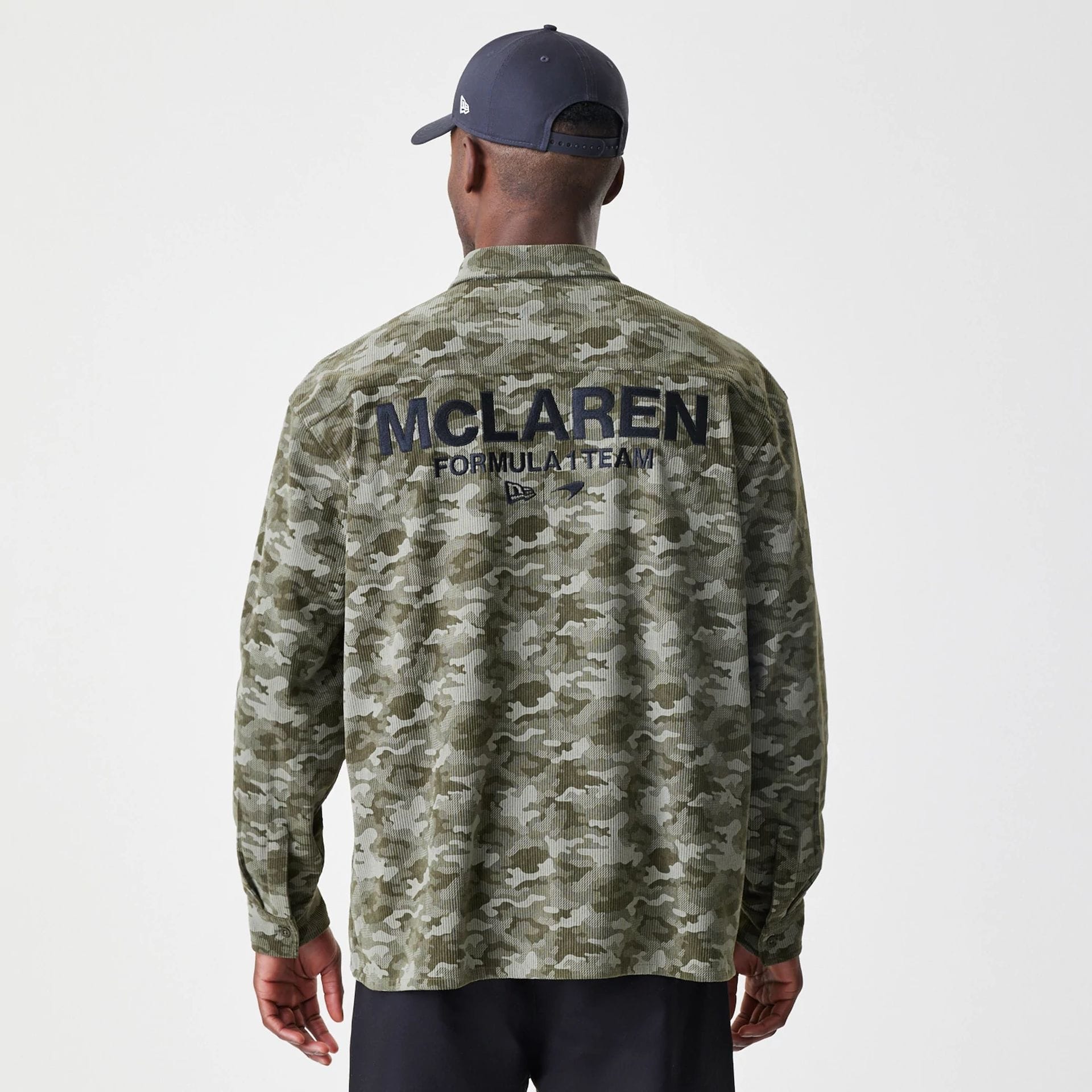 The Male model is wearing McLaren Racing Graphic Green Long Sleeve Shirt 2