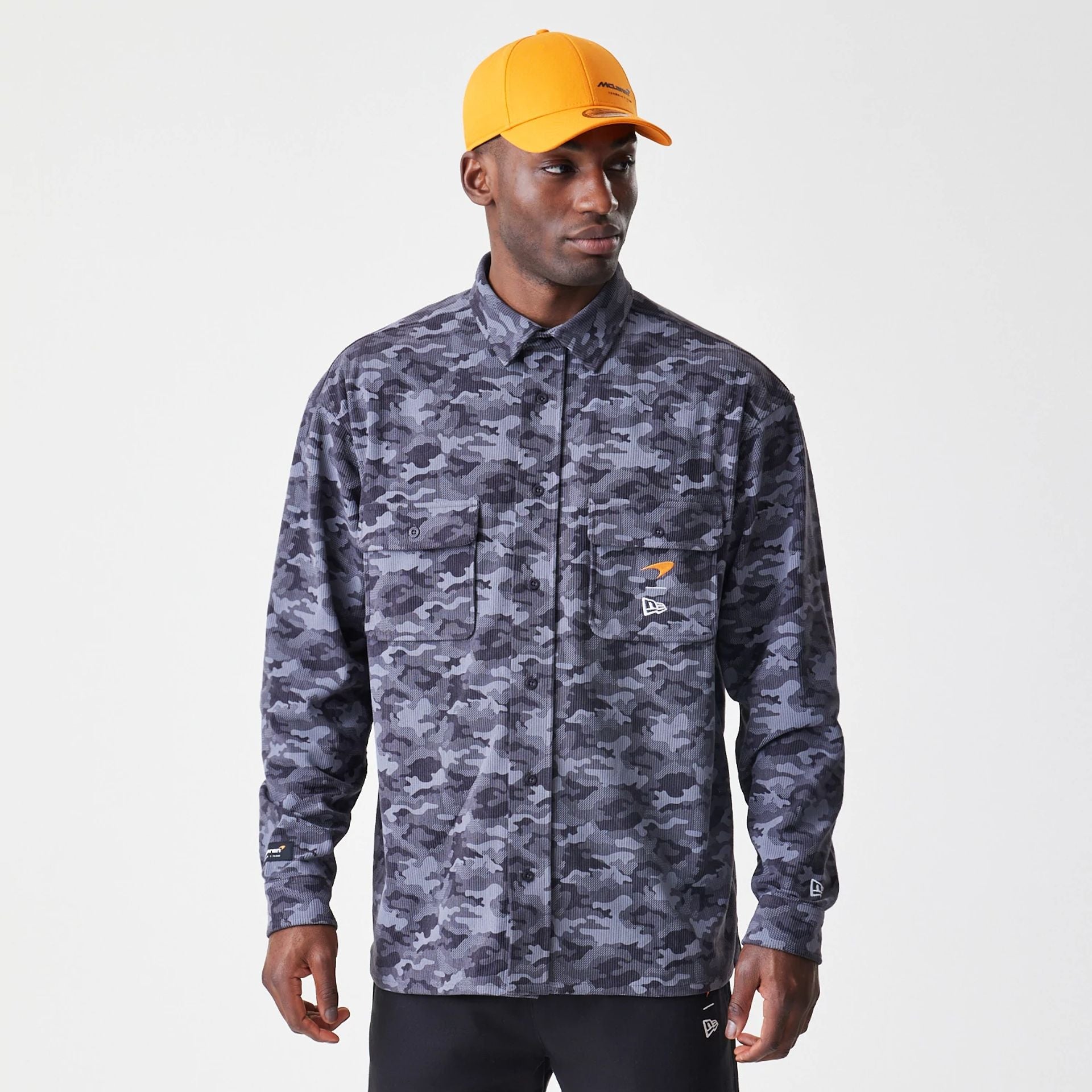 The Male model is wearing McLaren Racing Graphic Dark Grey Long Sleeve Shirt 1