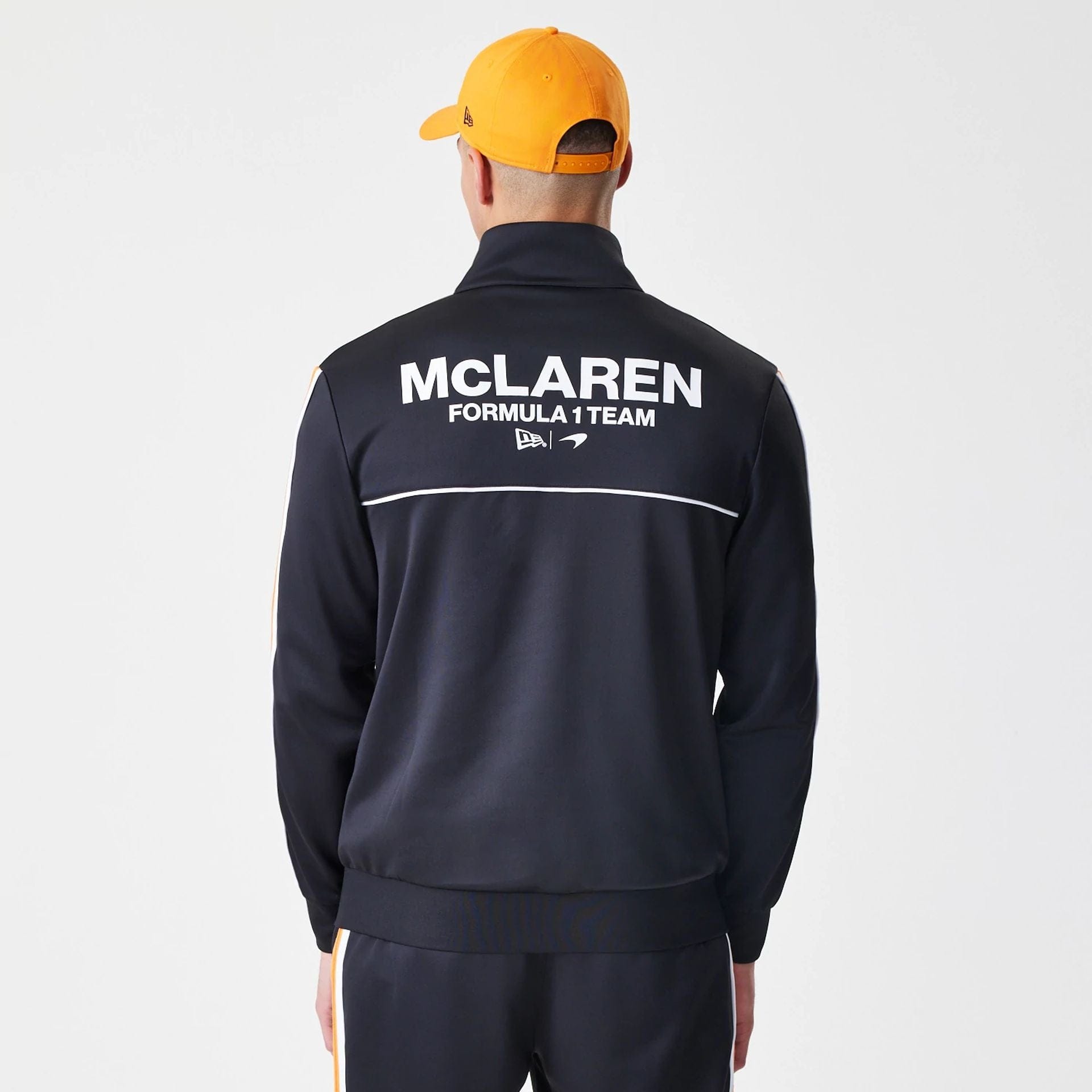 The Male model is wearing McLaren Racing Poly Black Track Jacket 2