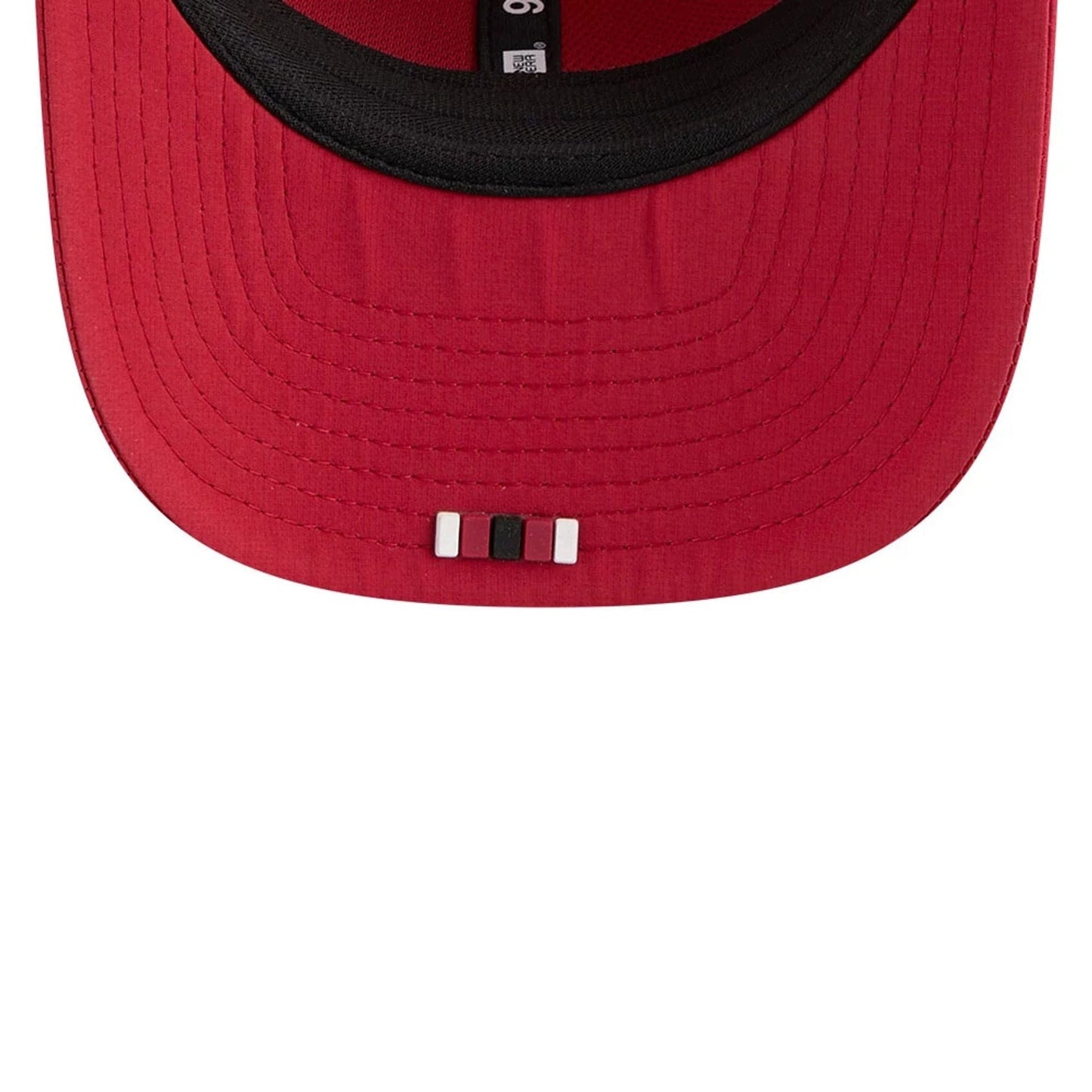 This is a Arizona Cardinals NFL Sideline 2025 Dark Red 9SEVENTY Trucker Stretch Snap Adjustable Cap 7