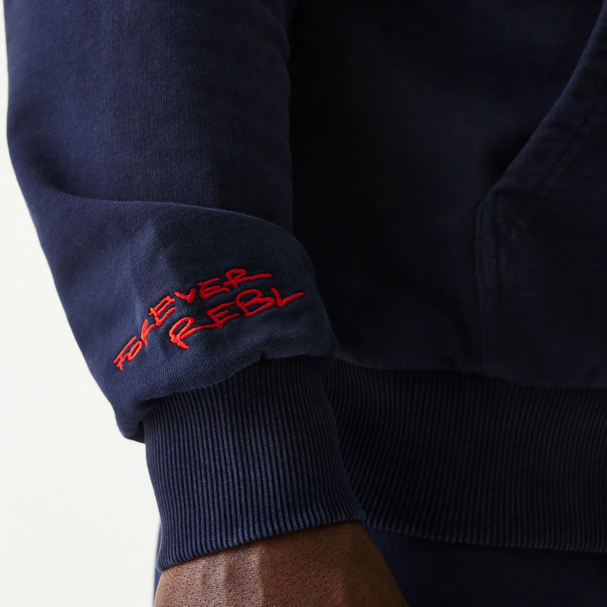 The Male model is wearing Red Bull Racing Dark Blue Oversized Full Zip Hoodie 4
