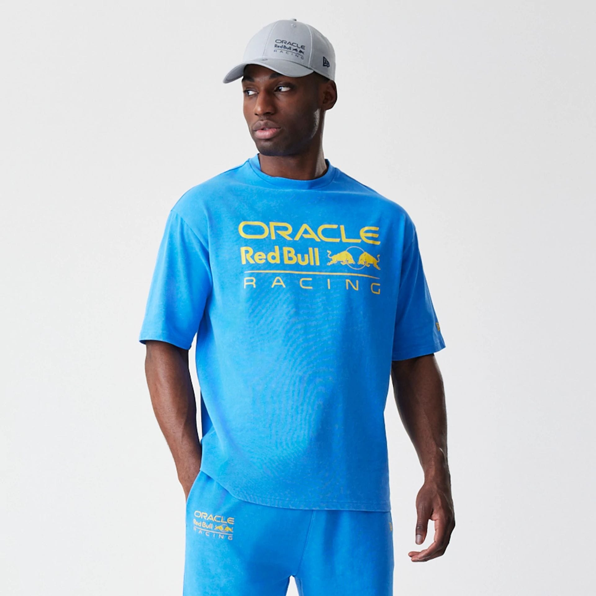 The Male model is wearing Red Bull Racing Blue Oversized T-Shirt 1