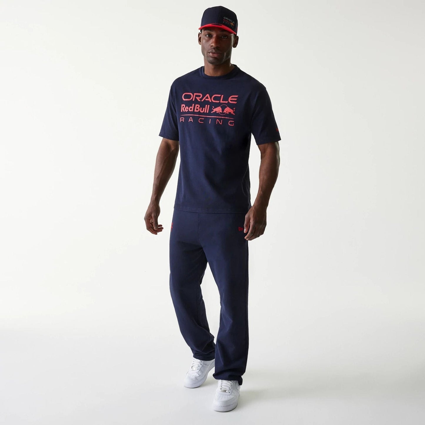 The Male model is wearing Red Bull Racing Dark Blue Oversized T-Shirt 8